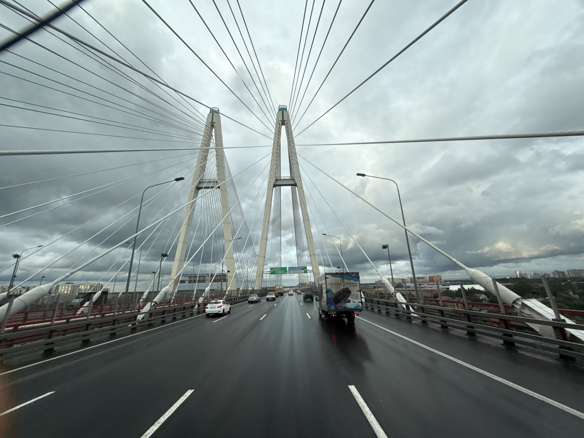 Crossing a cable-stayed bridge under stormy skies in Saint Petersburg