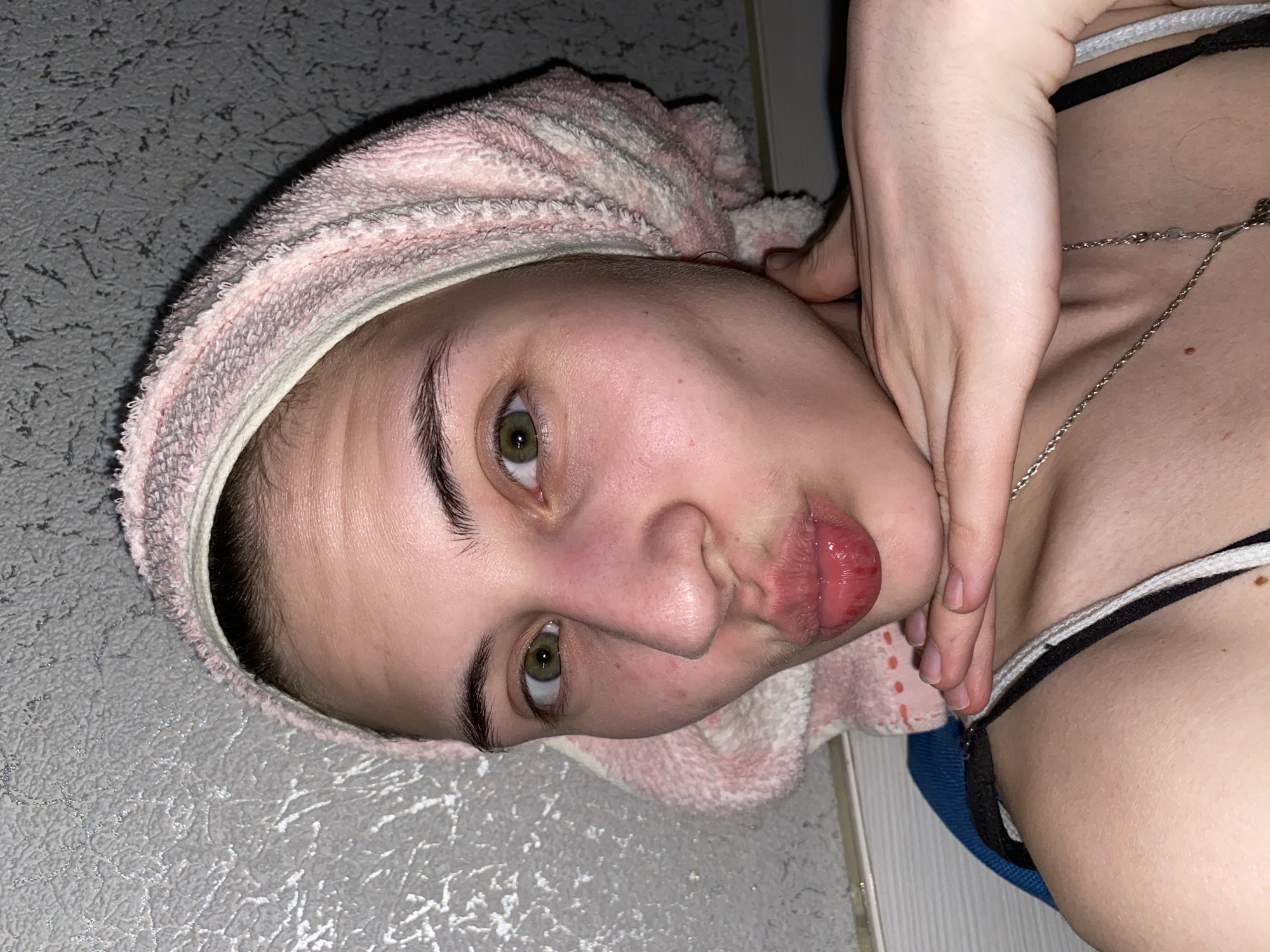Domestic moments captured: woman with towel, cats in Votkinsk