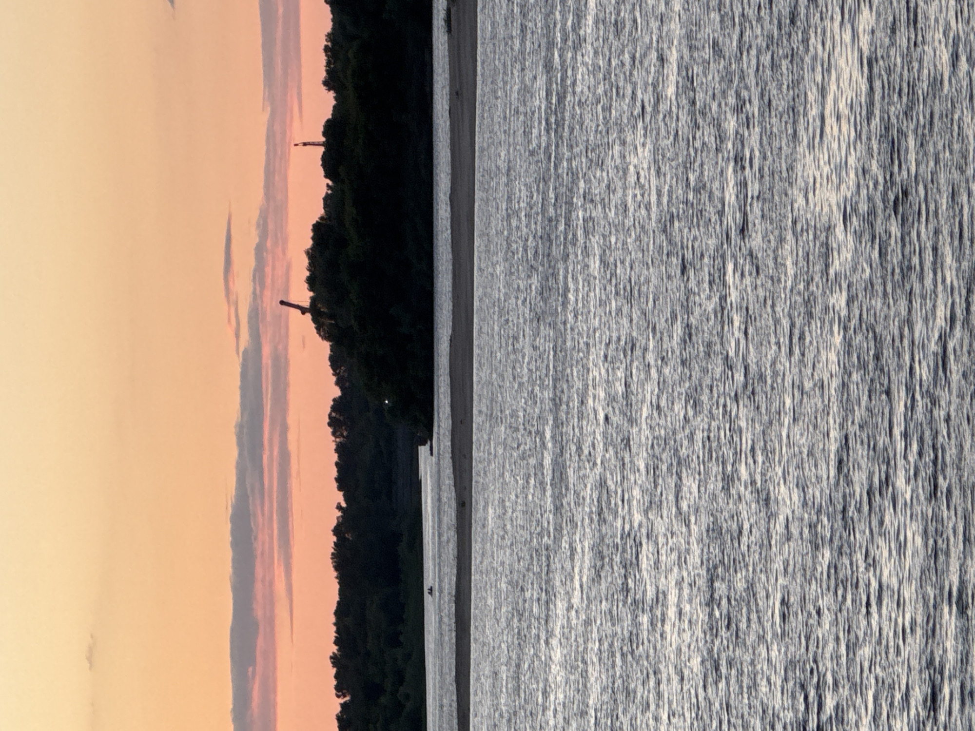 Sunset over Nizhny Novgorod's rivers, bridges, and stadium