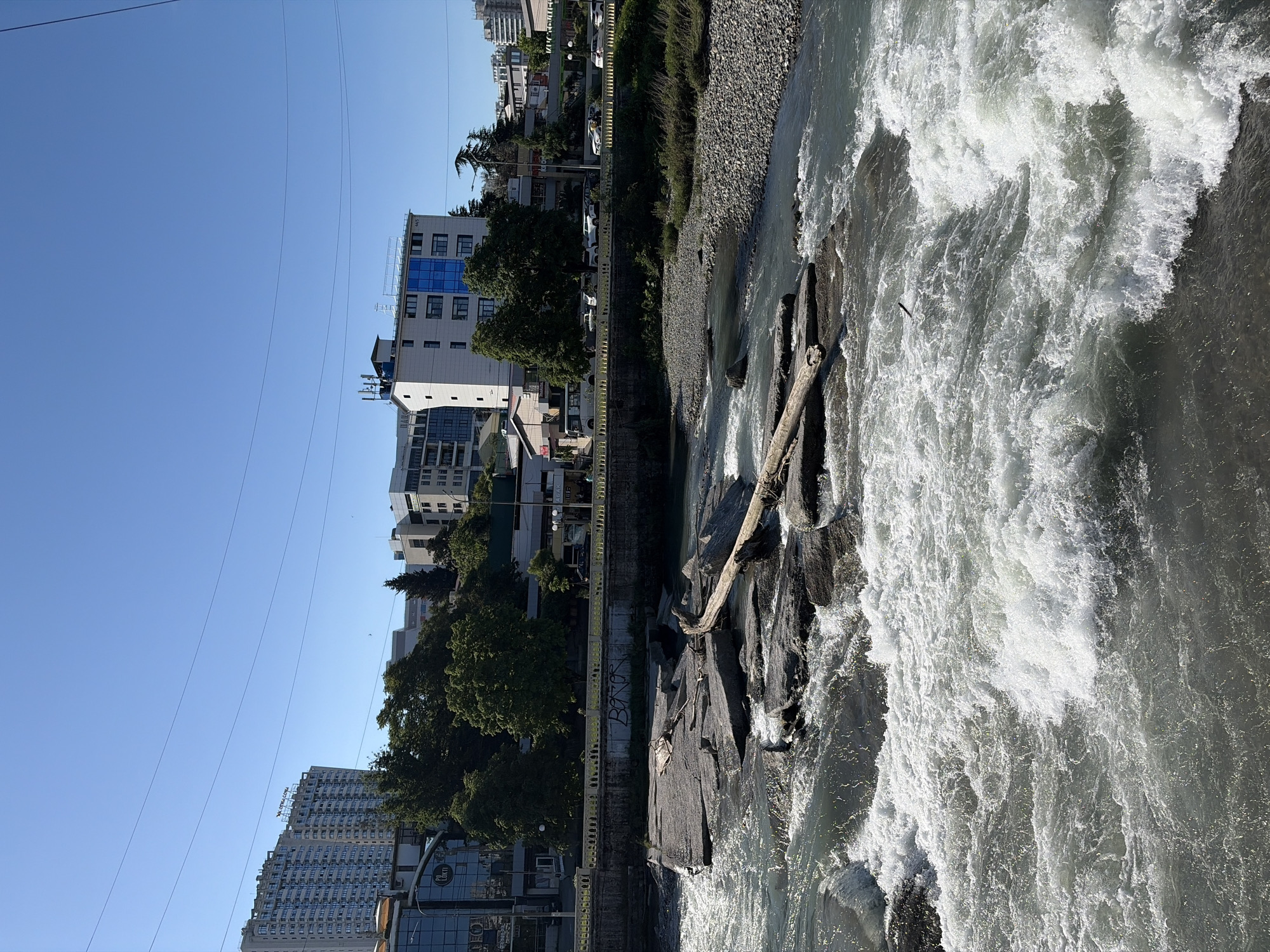 Morning documentation of Sochi riverside infrastructure and urban landscape