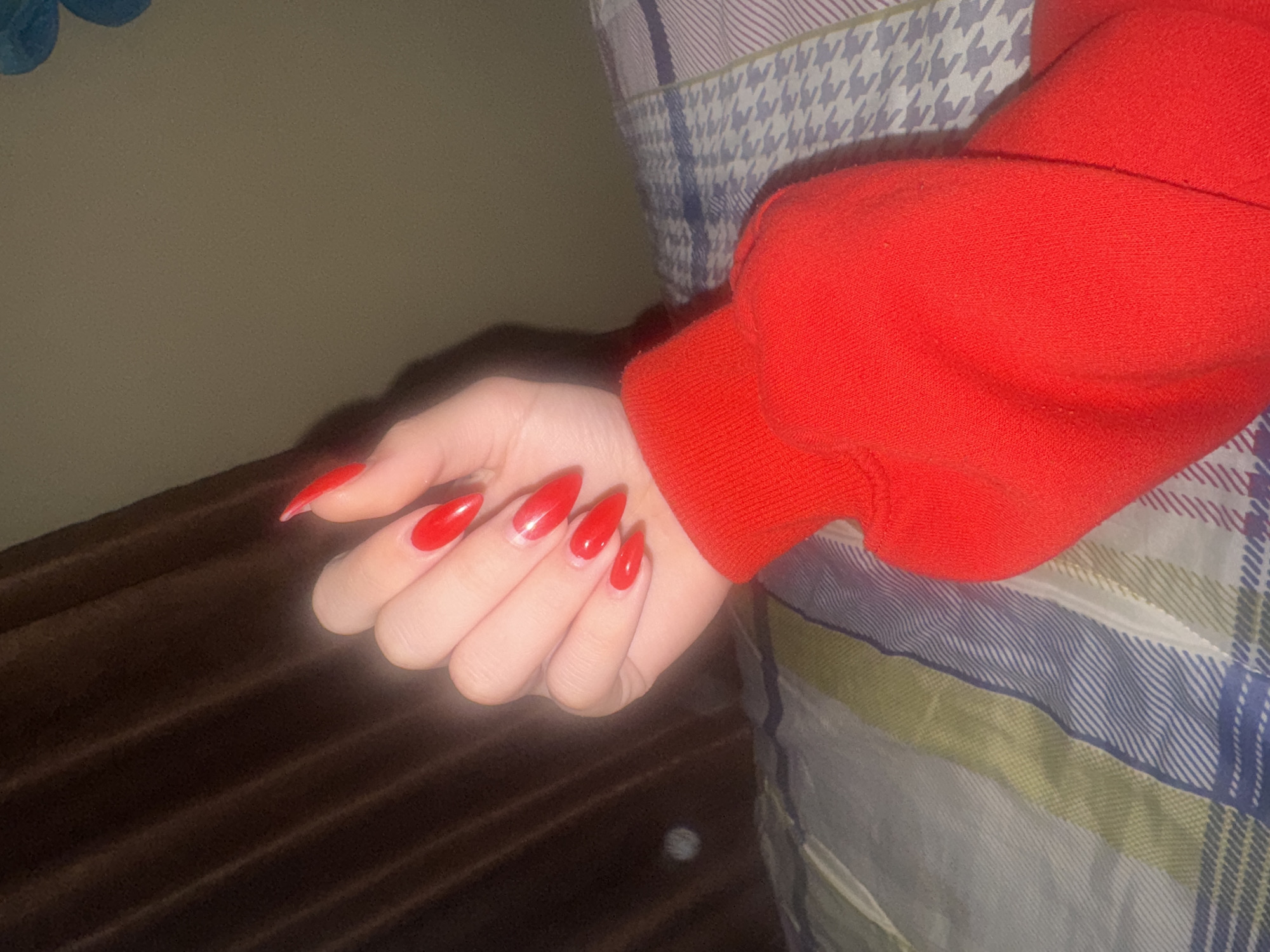 Hand with red nails photographed in Lehchevo, Bulgaria