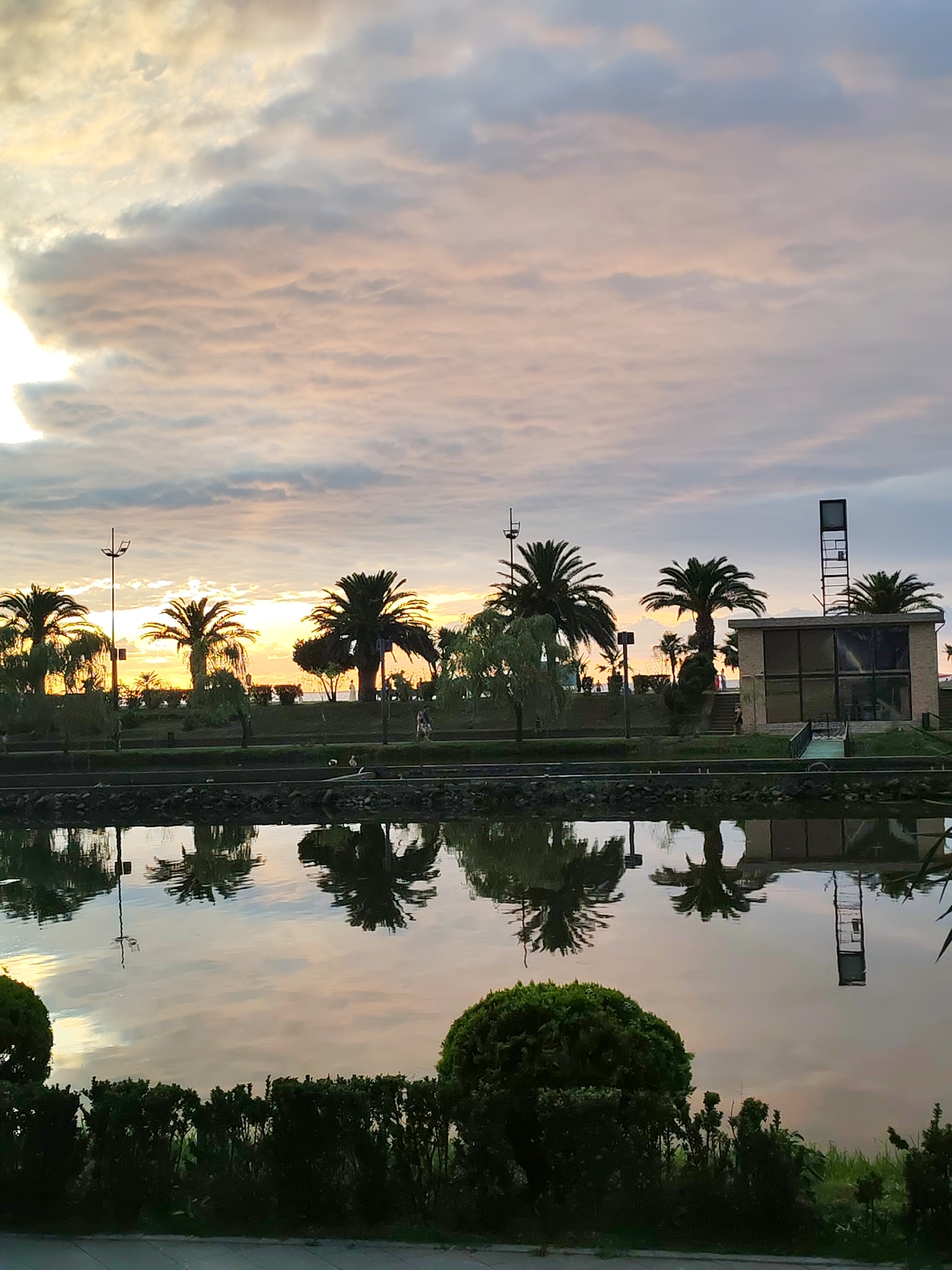 Batumi Boulevard at sunset, featuring the upside-down Restaurant Senate