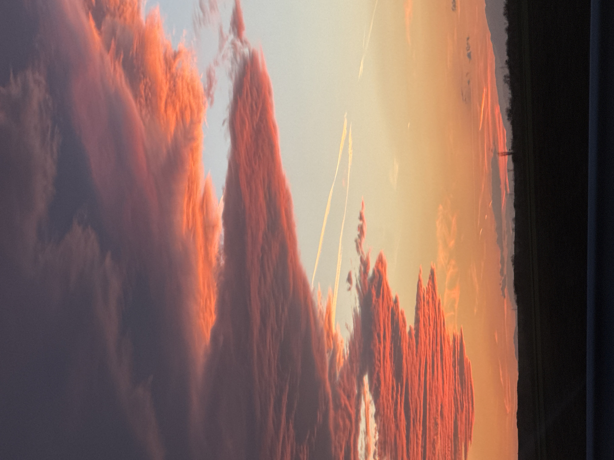 Dramatic sunset clouds with contrails observed in Malenovo, Bulgaria
