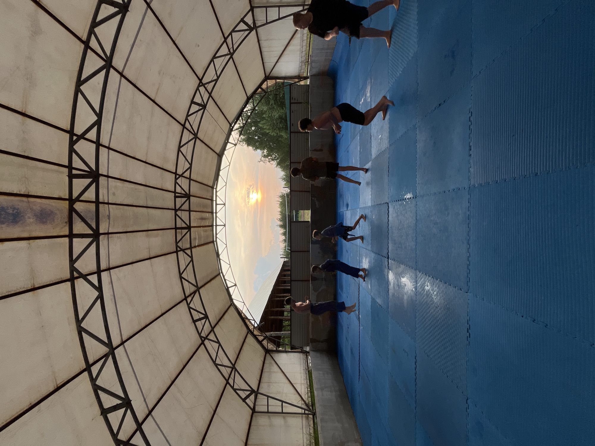 Outdoor martial arts training under a canopy in Krasnoturansk