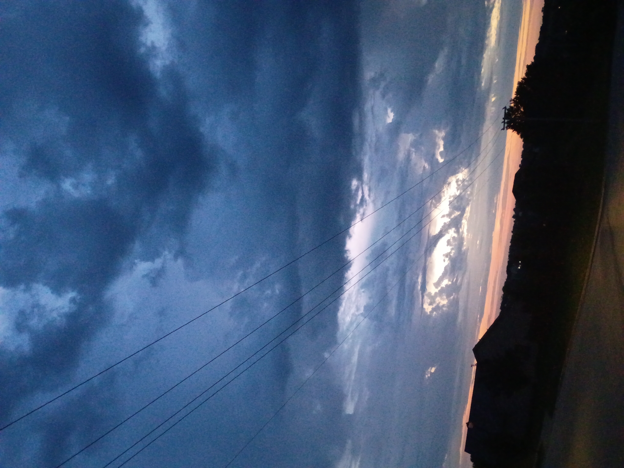Storm clouds gather over Richmond neighborhoods on Independence Day