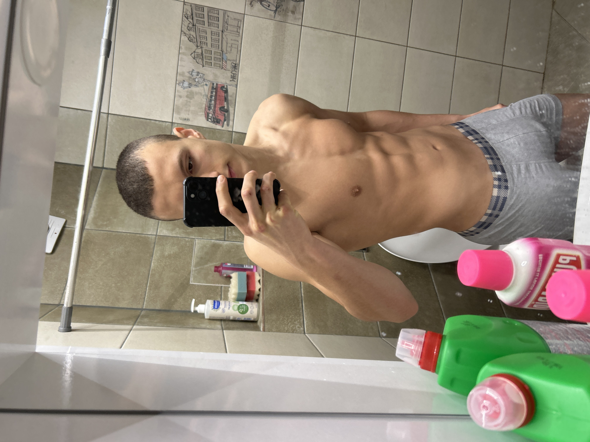 Man takes shirtless bathroom selfie in Burgas, Bulgaria