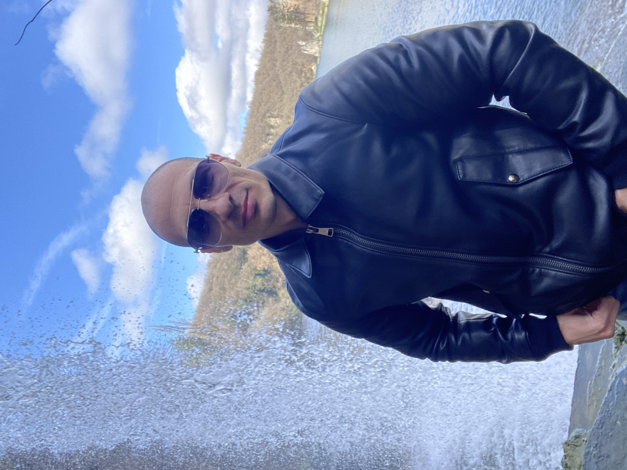 Visitors photographed at Kaylaka Park waterfall and lake overlooks
