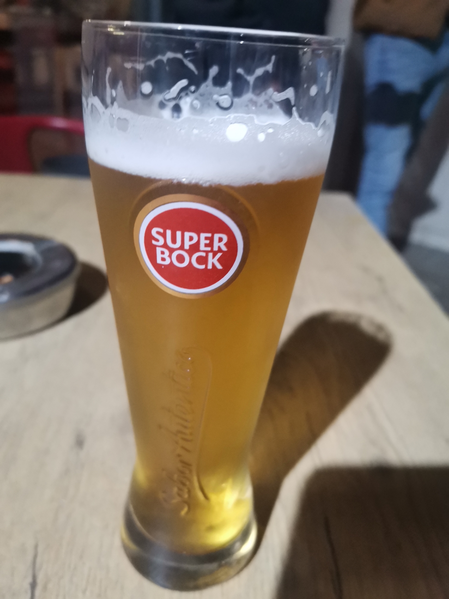 Evening at Portuguese café featuring Super Bock beer service