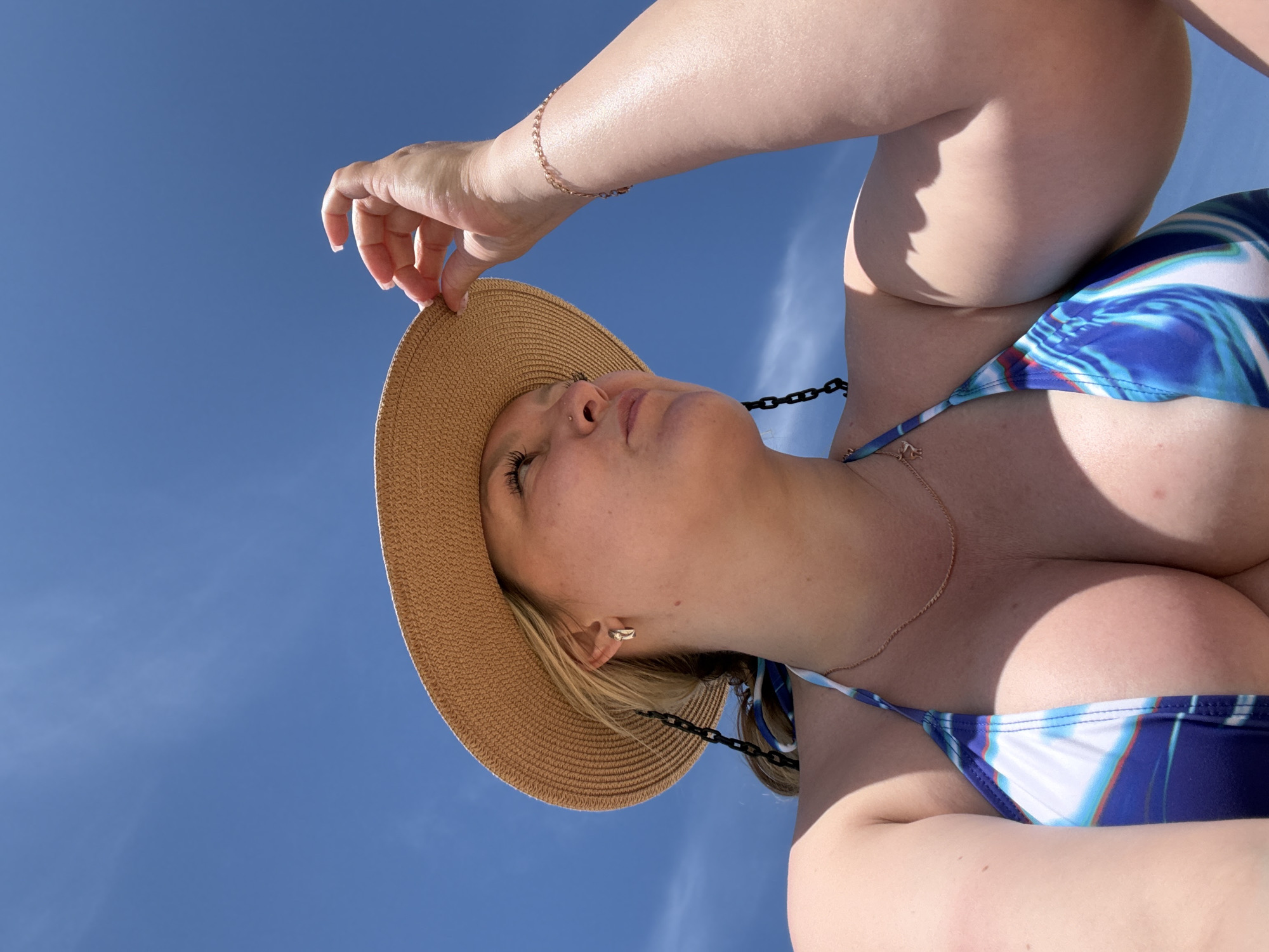 Person photographed gazing skyward in Anapa, Russia