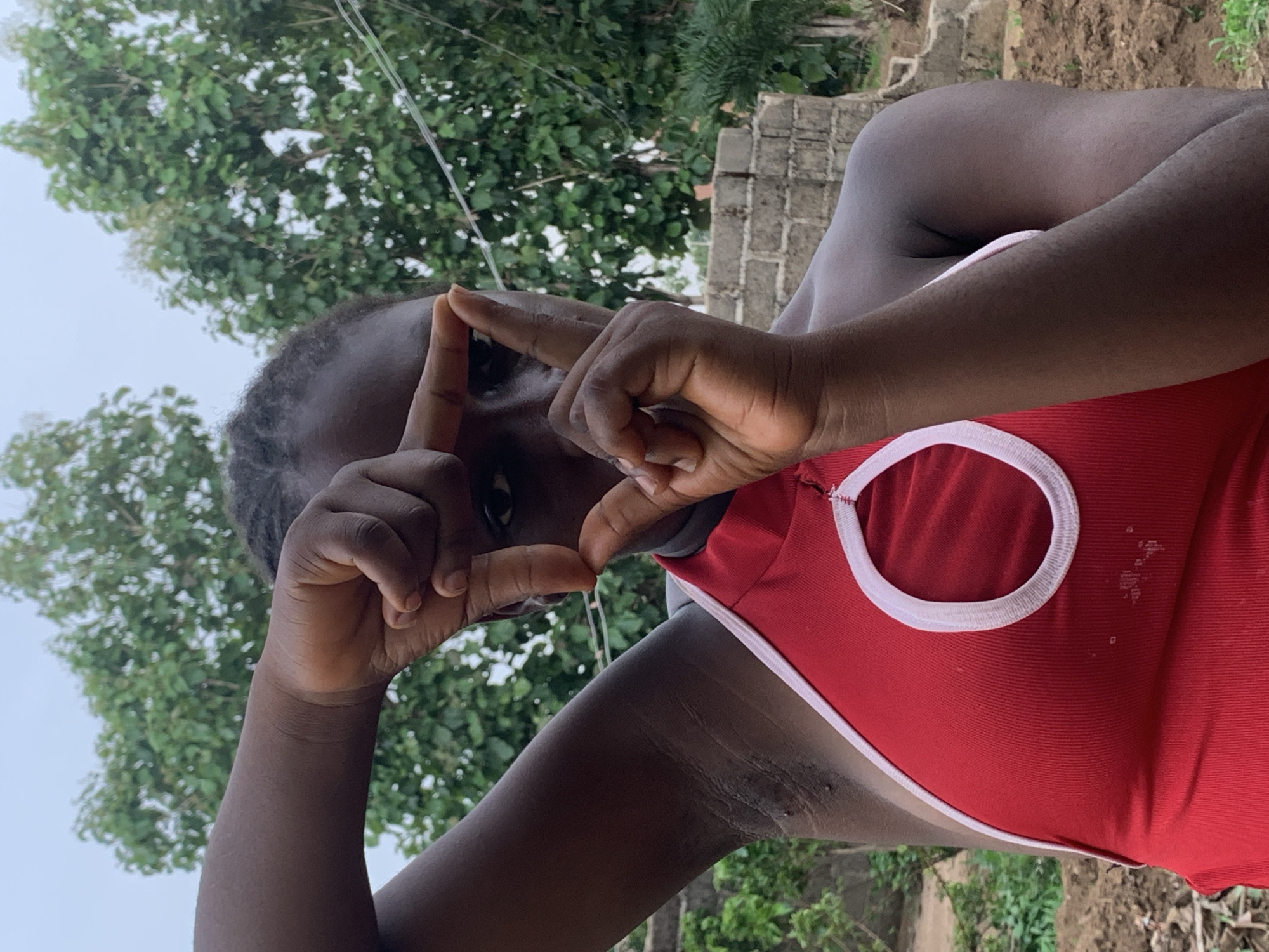 Woman poses for photos in Agban, Nigeria
