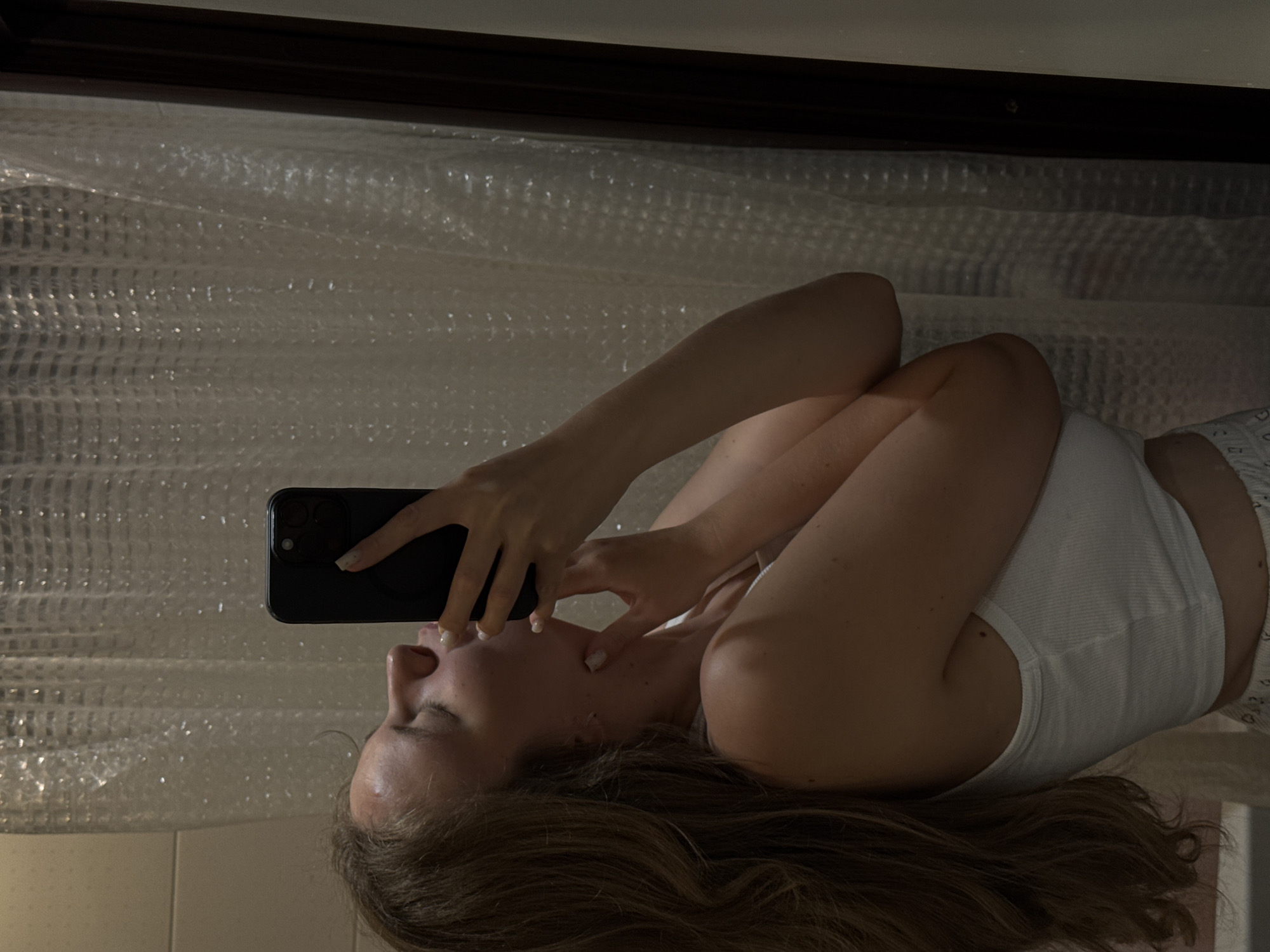 Bathroom mirror selfie session in Vladimir, Russia