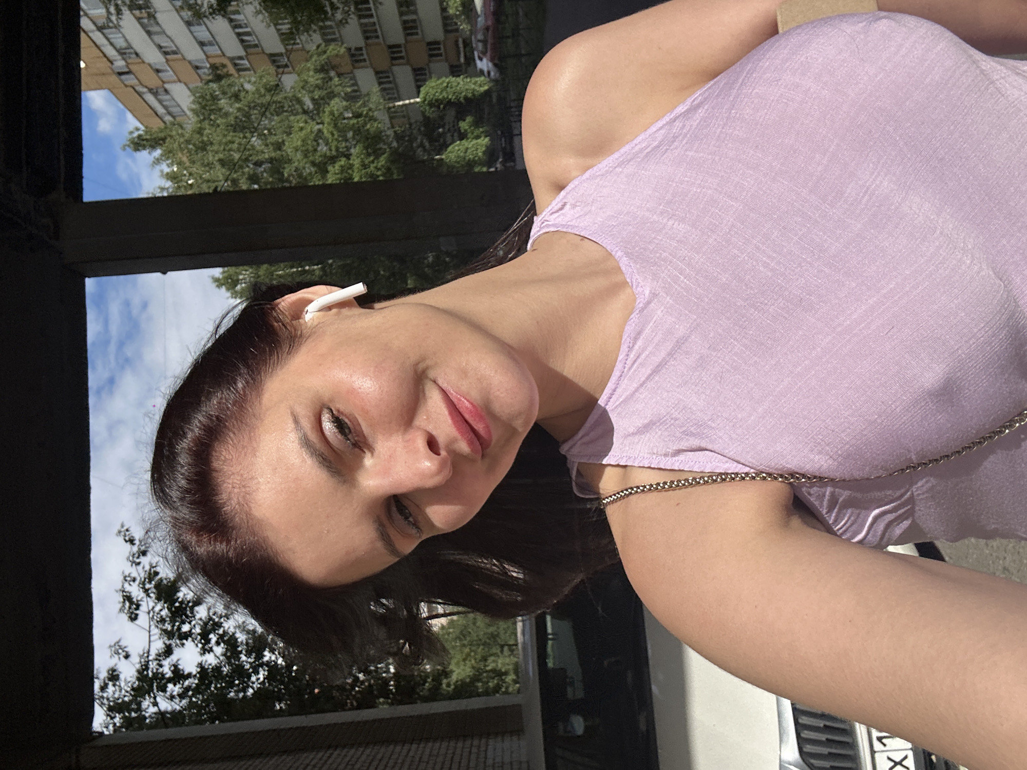 Sunny selfies outside a Saint Petersburg apartment block