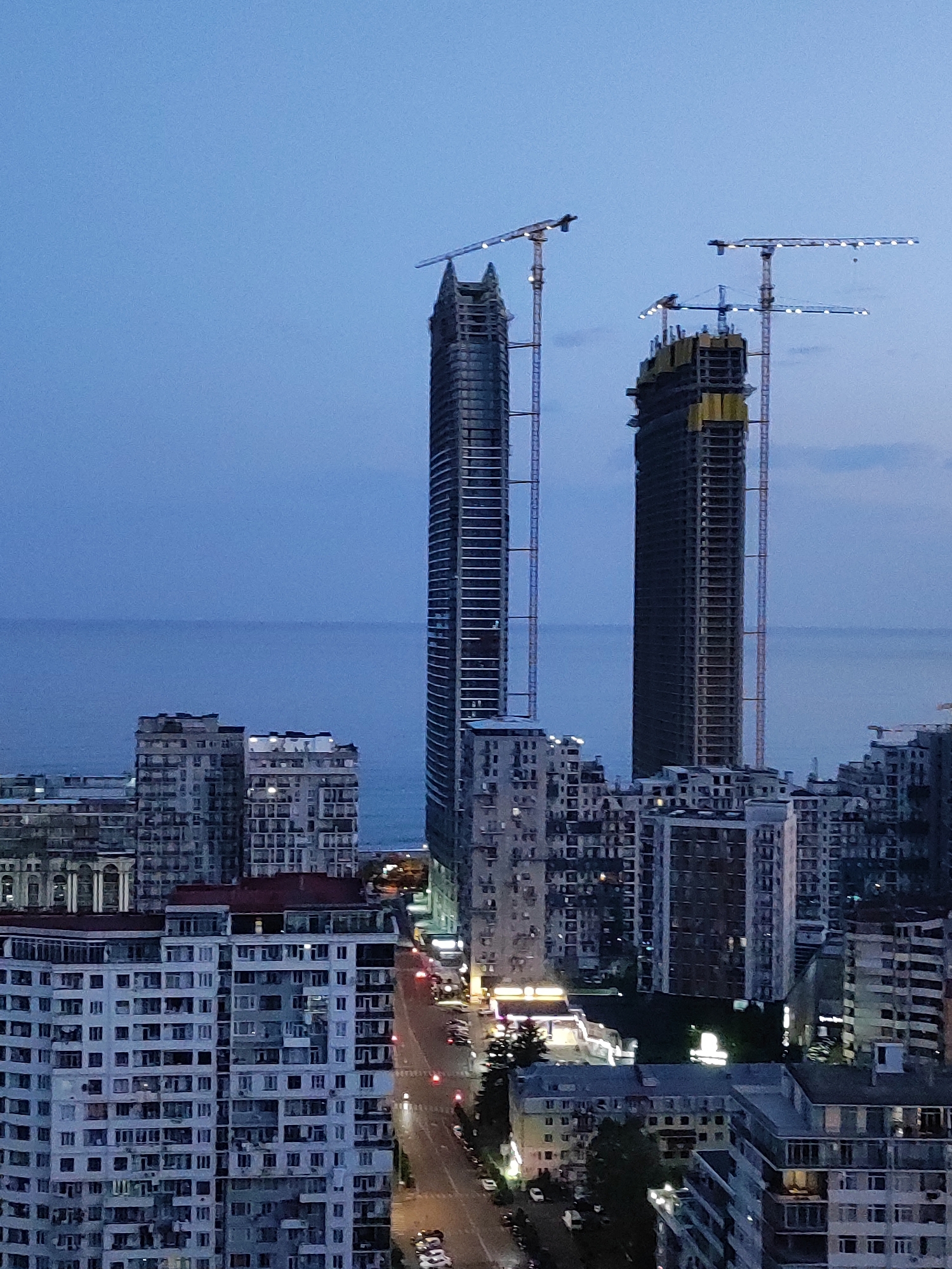 Batumi at night: construction skyline, coastline, and street scenes