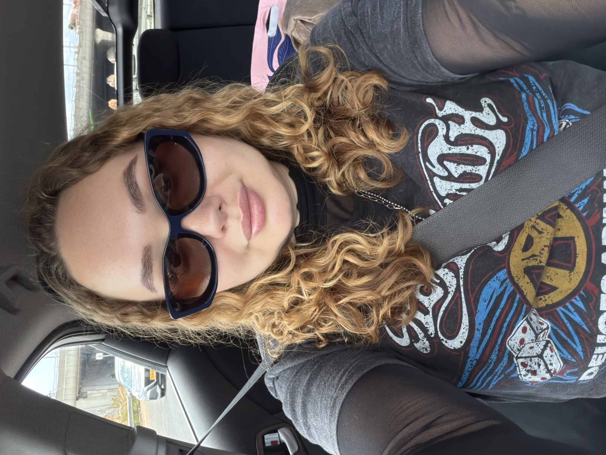 Person photographed sitting in car in Ramat HaSharon