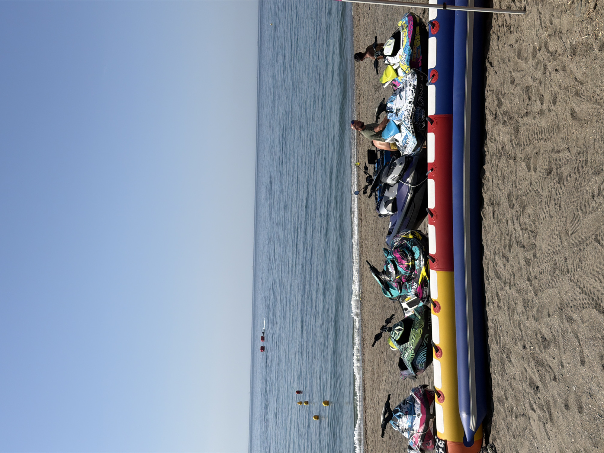 Summer morning on the Estepona coast: water sports, history, and smoke