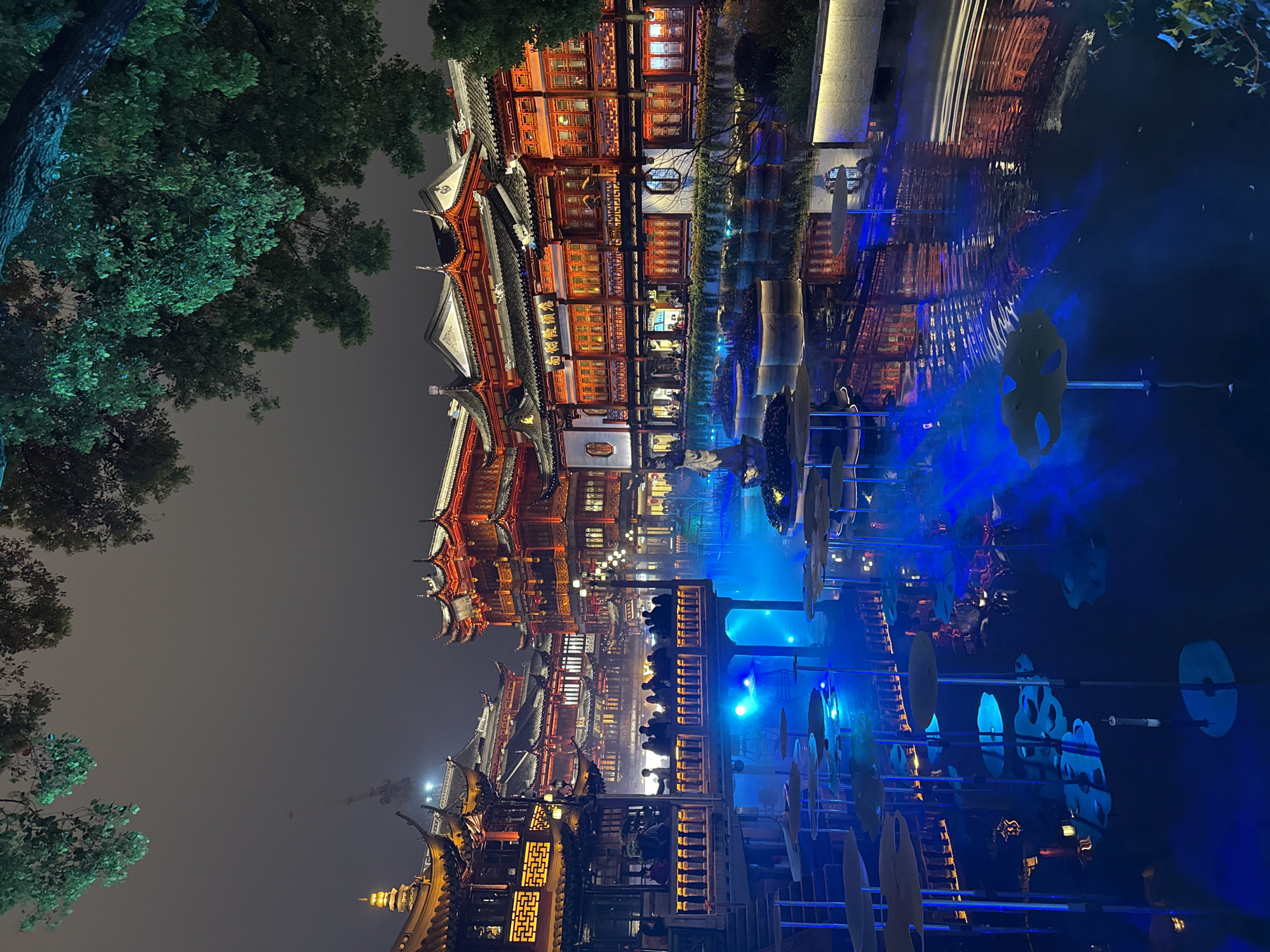 Traditional Chinese building reflected in Shanghai waters at night