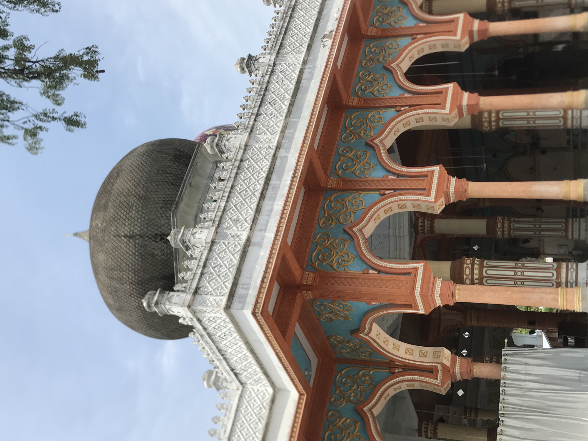 Ornate mosque photographed from multiple angles in Palohgadeng, Indonesia