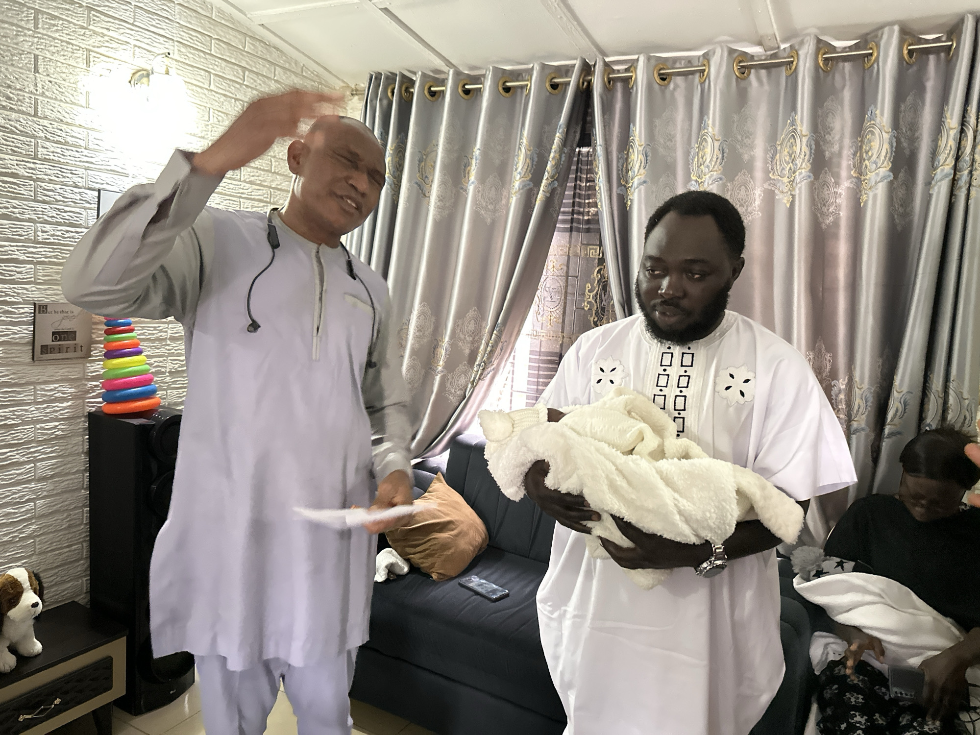 Newborn welcomed at a home gathering in Narayi, Nigeria
