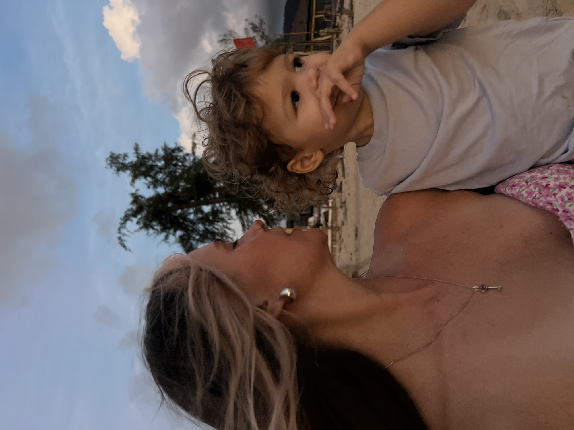 Beach hangout with dramatic skies and family moments at dusk