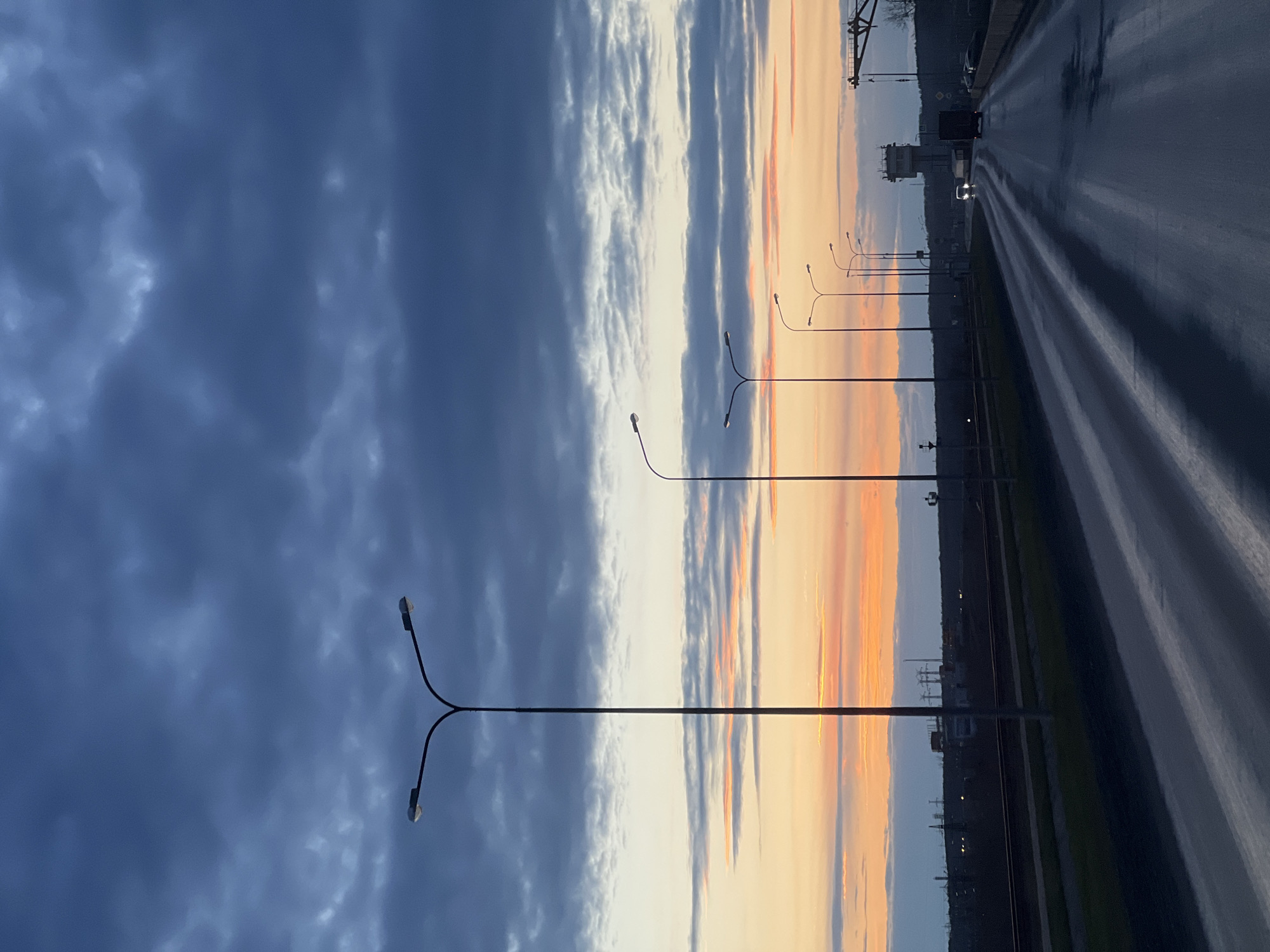 Dramatic sunset clouds captured on Chaikovsky road