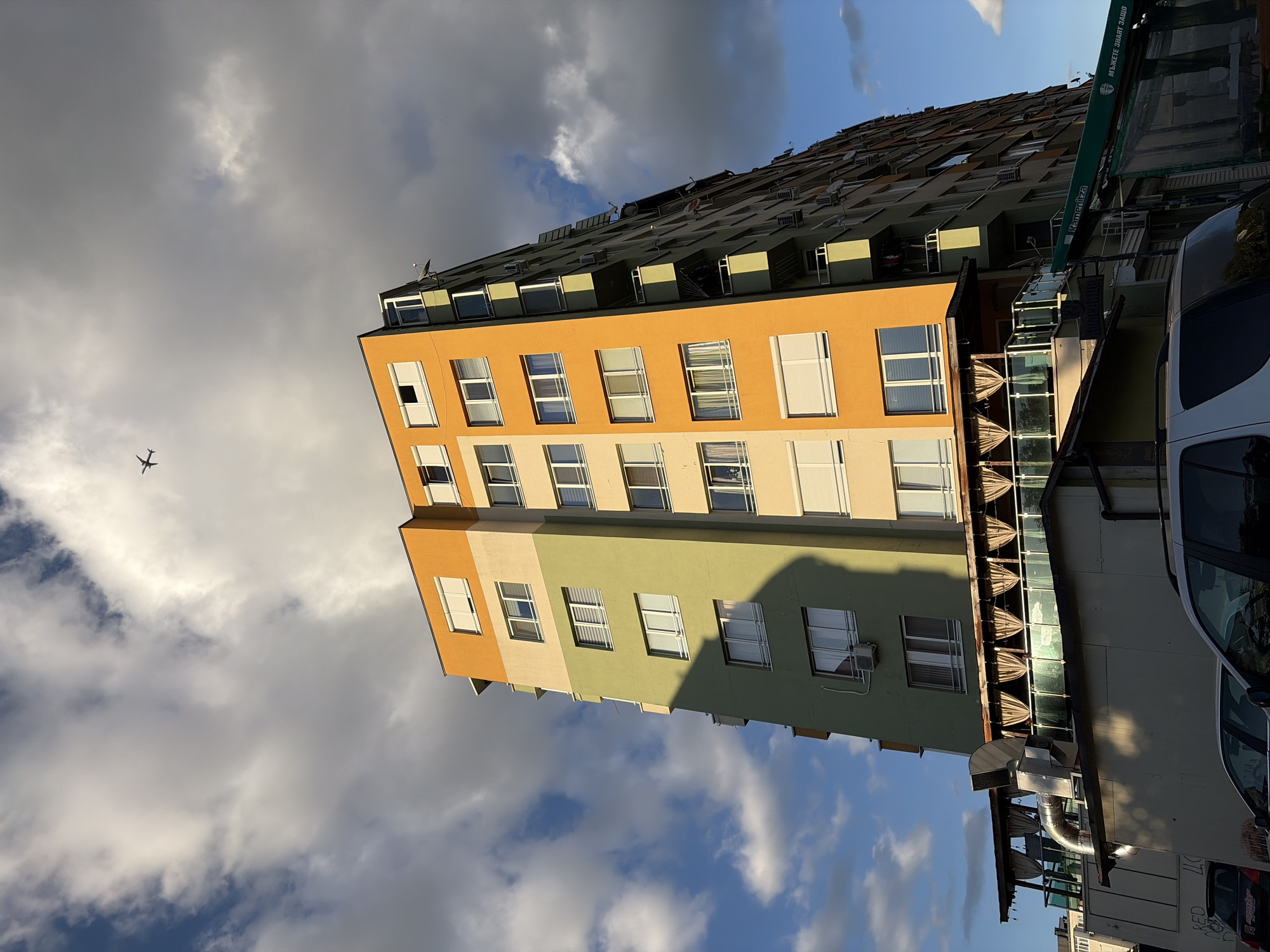 Colorful apartment complex photographed from multiple angles
