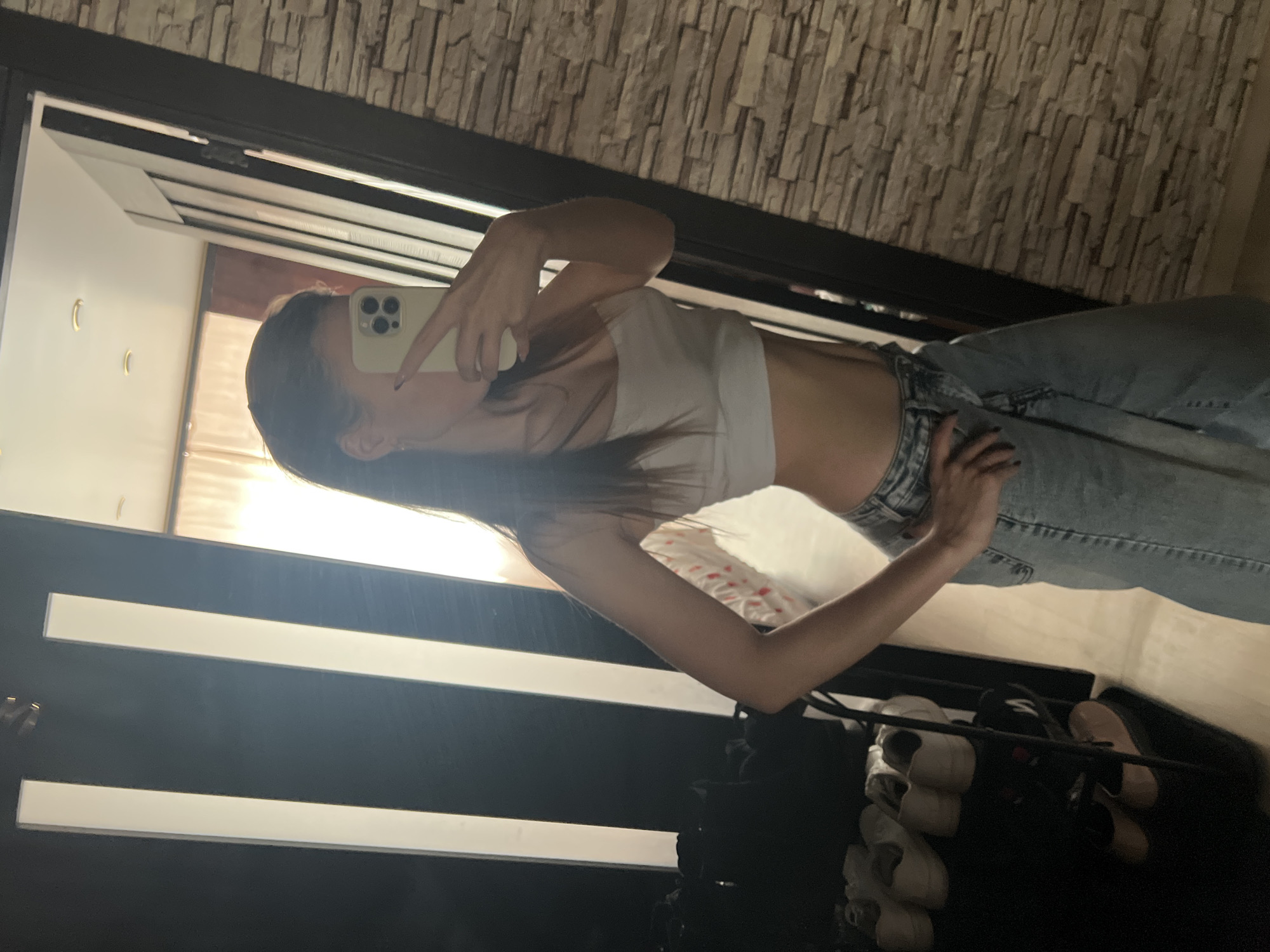 Woman takes morning selfies in bedroom in Noviy, Russia