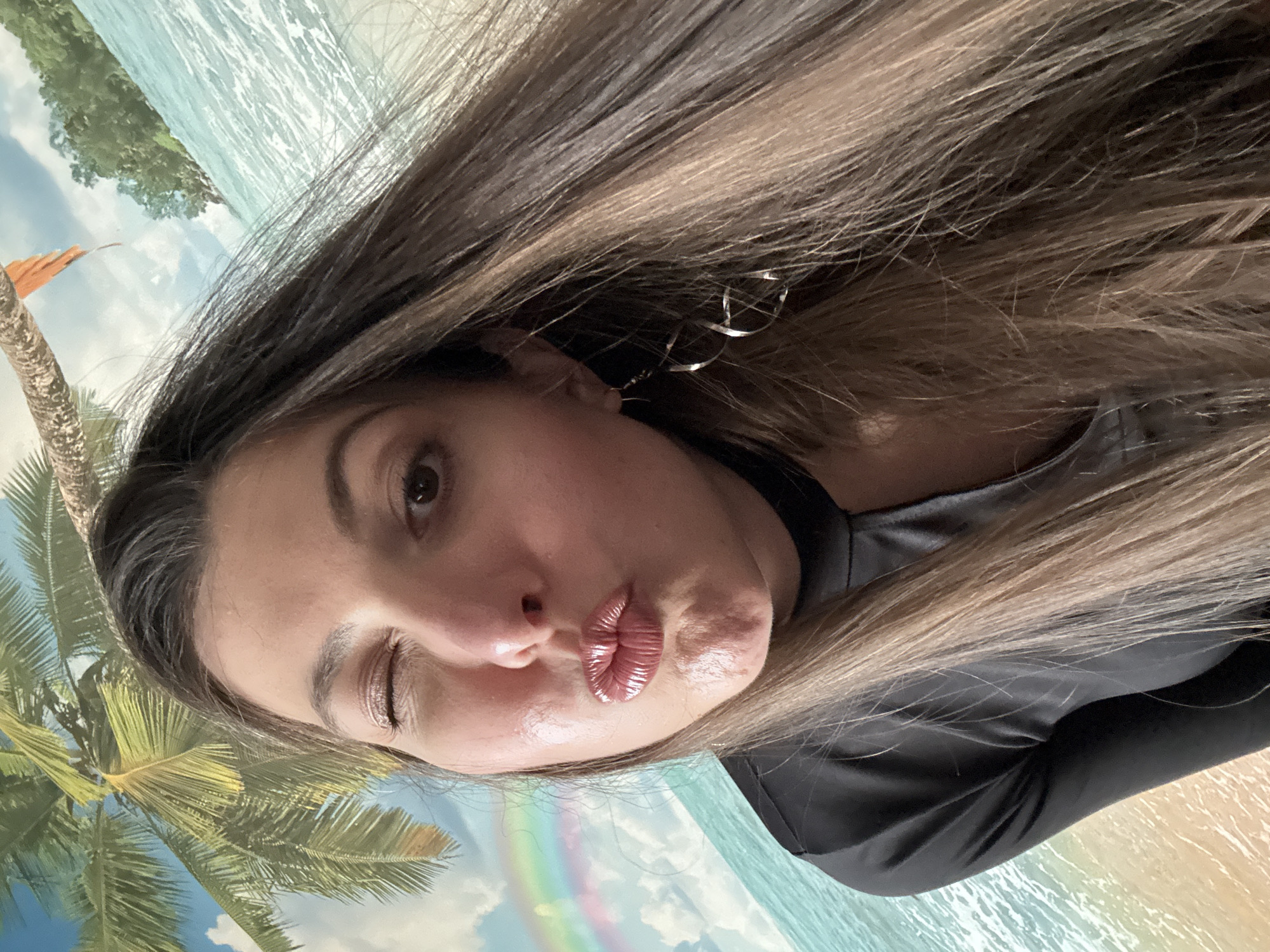 Woman captures selfies in elevator and altered background setting