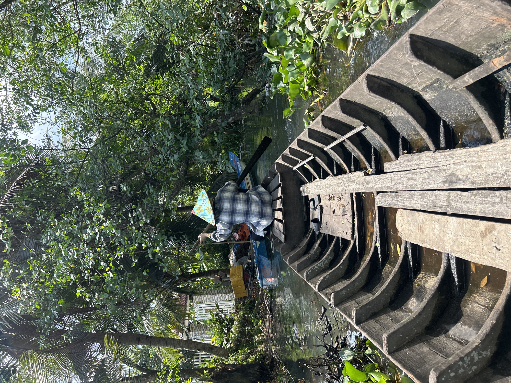 Morning scenes: canal boat, playful kittens, rural Vietnam life