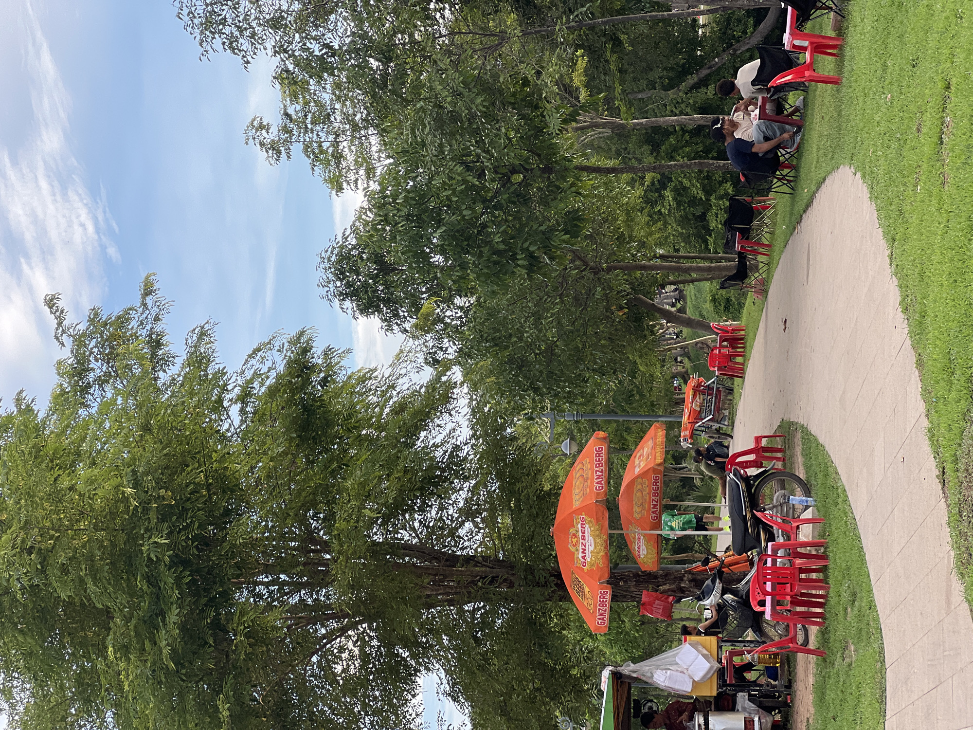 Morning life unfolds at Siem Reap riverside park