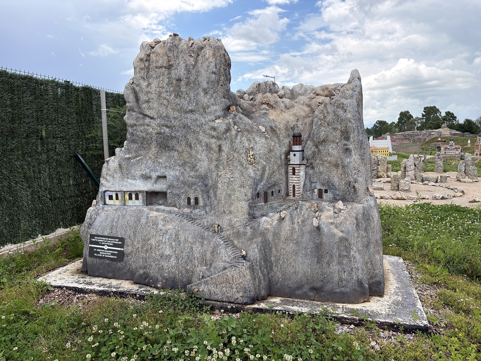 Tourist documents Bulgarian miniature park featuring historical landmarks