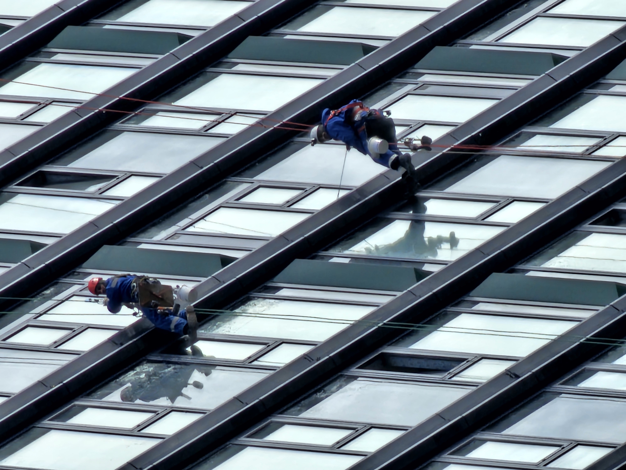 Window washers service modern Moscow building exterior