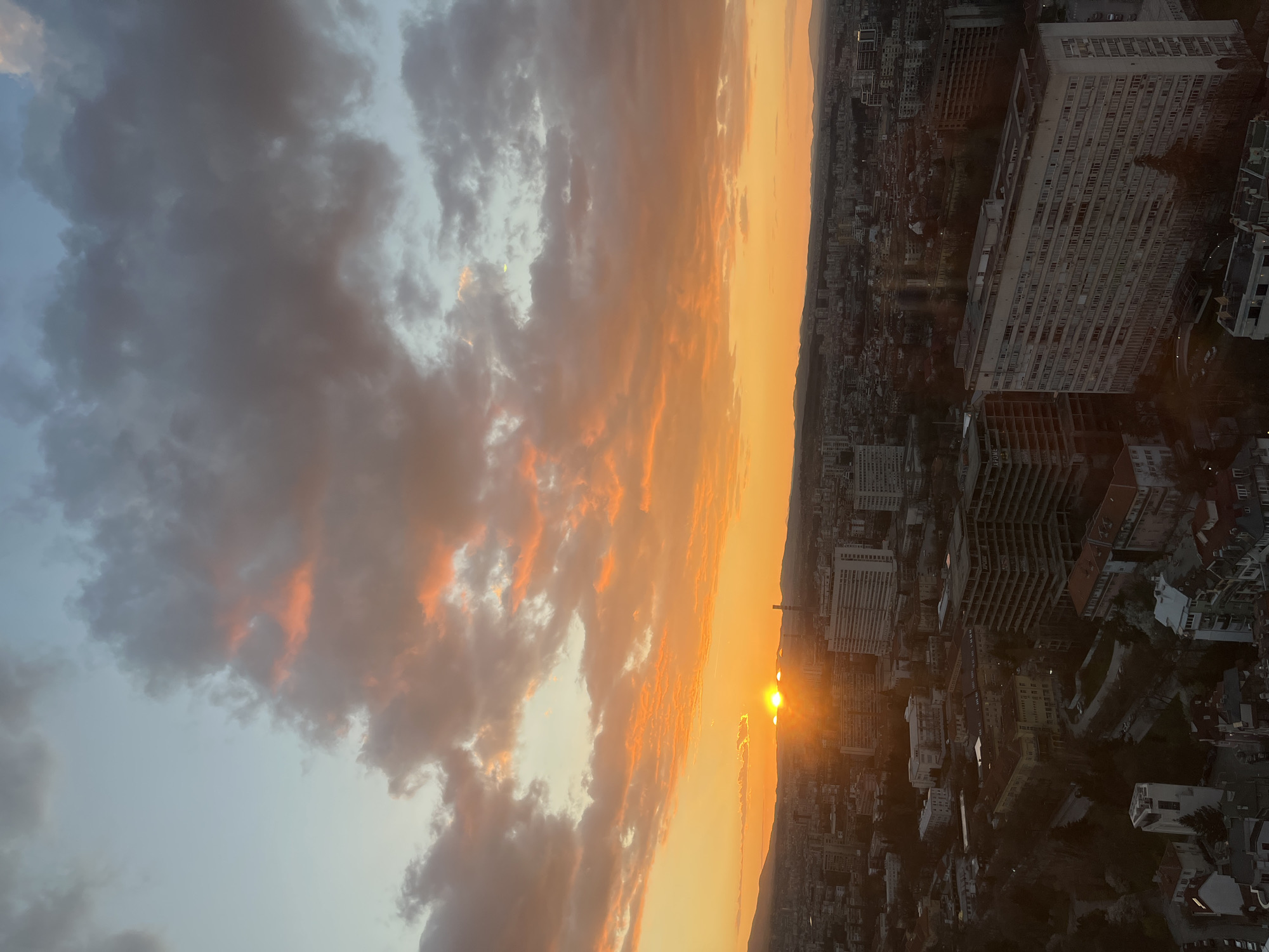 Sunset documented over Sofia skyline from elevated viewpoint