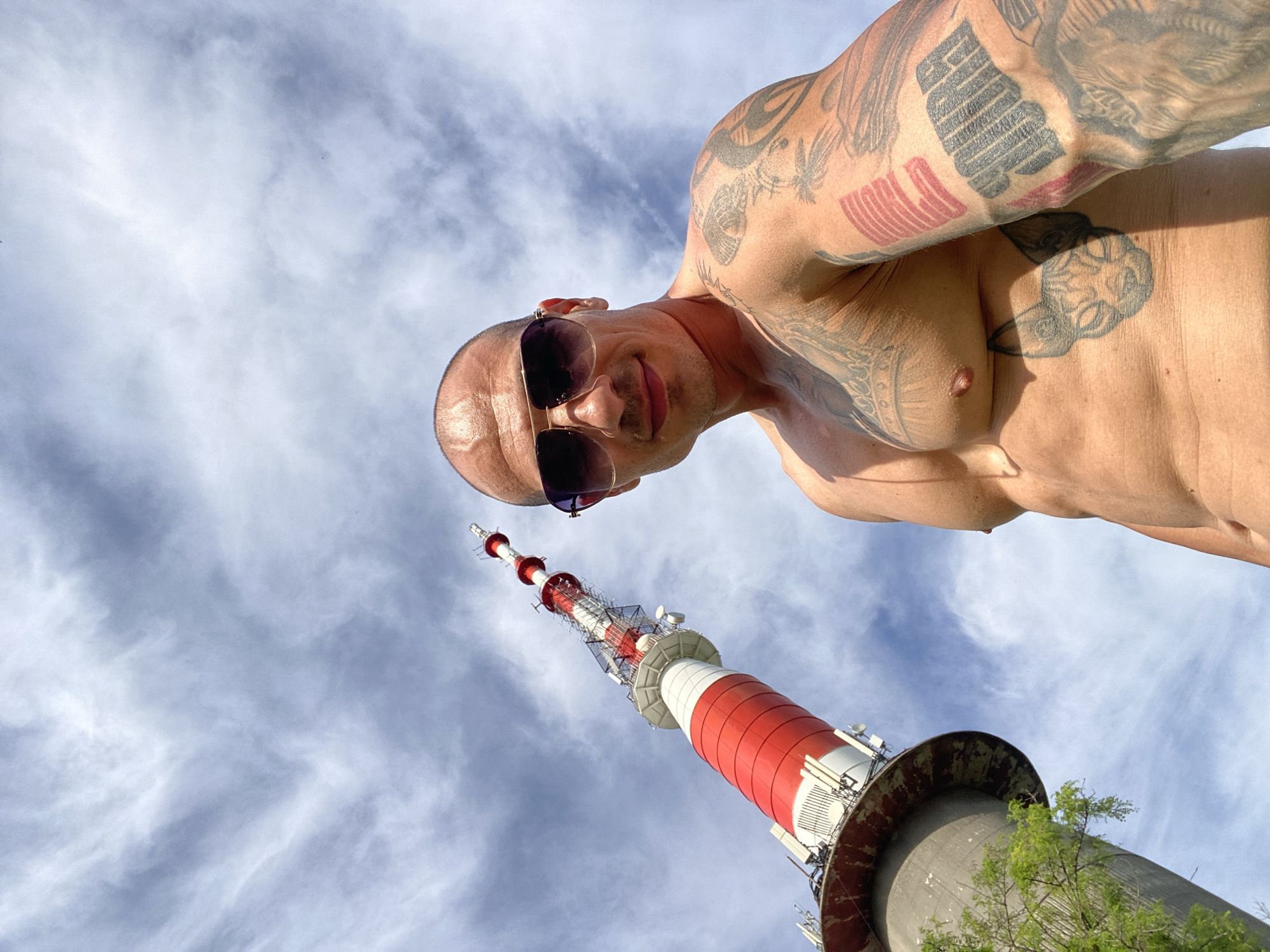 Couple photographs themselves near Pleven TV tower during afternoon outing