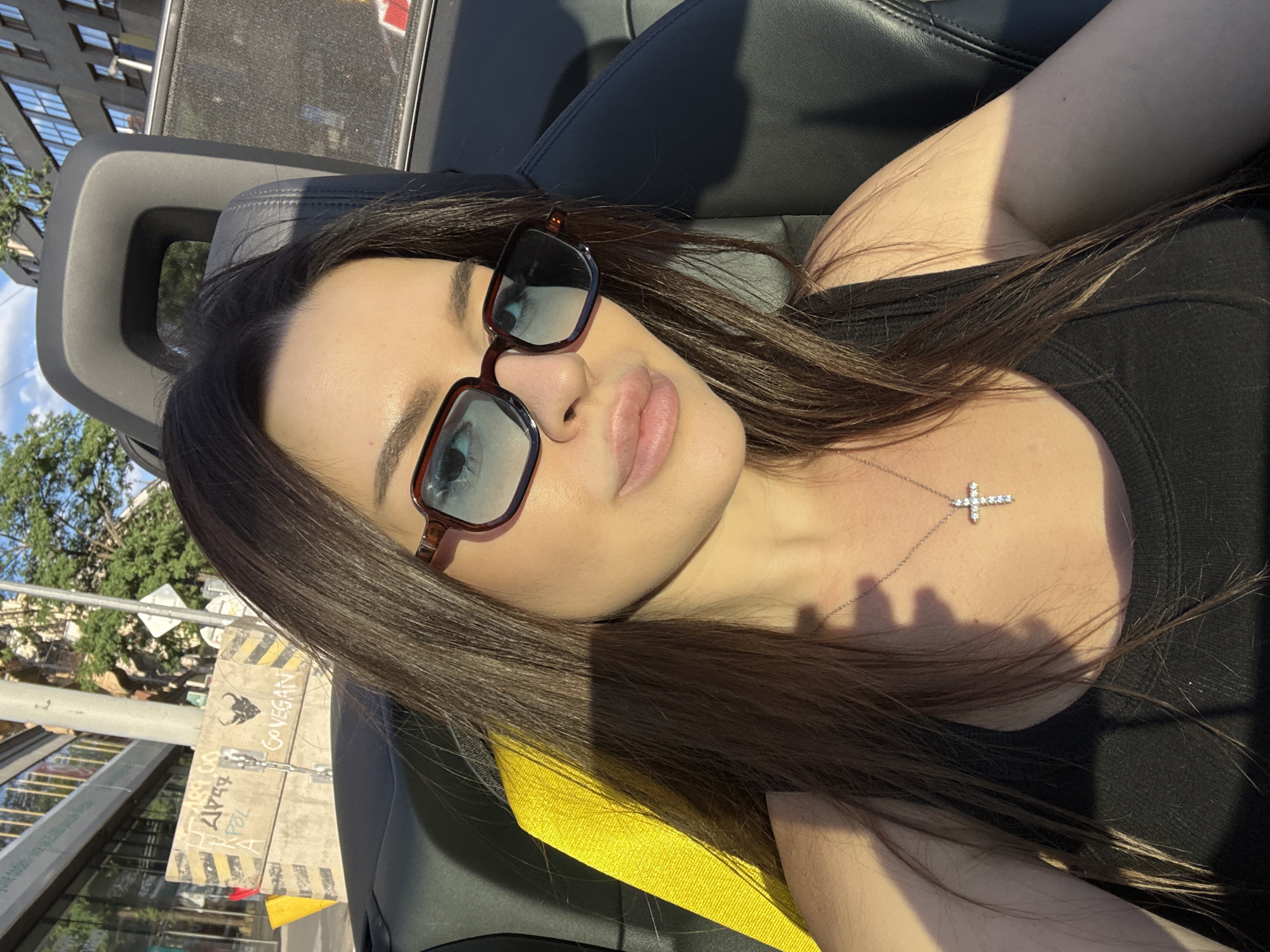Sunny convertible moment cruising through Prague