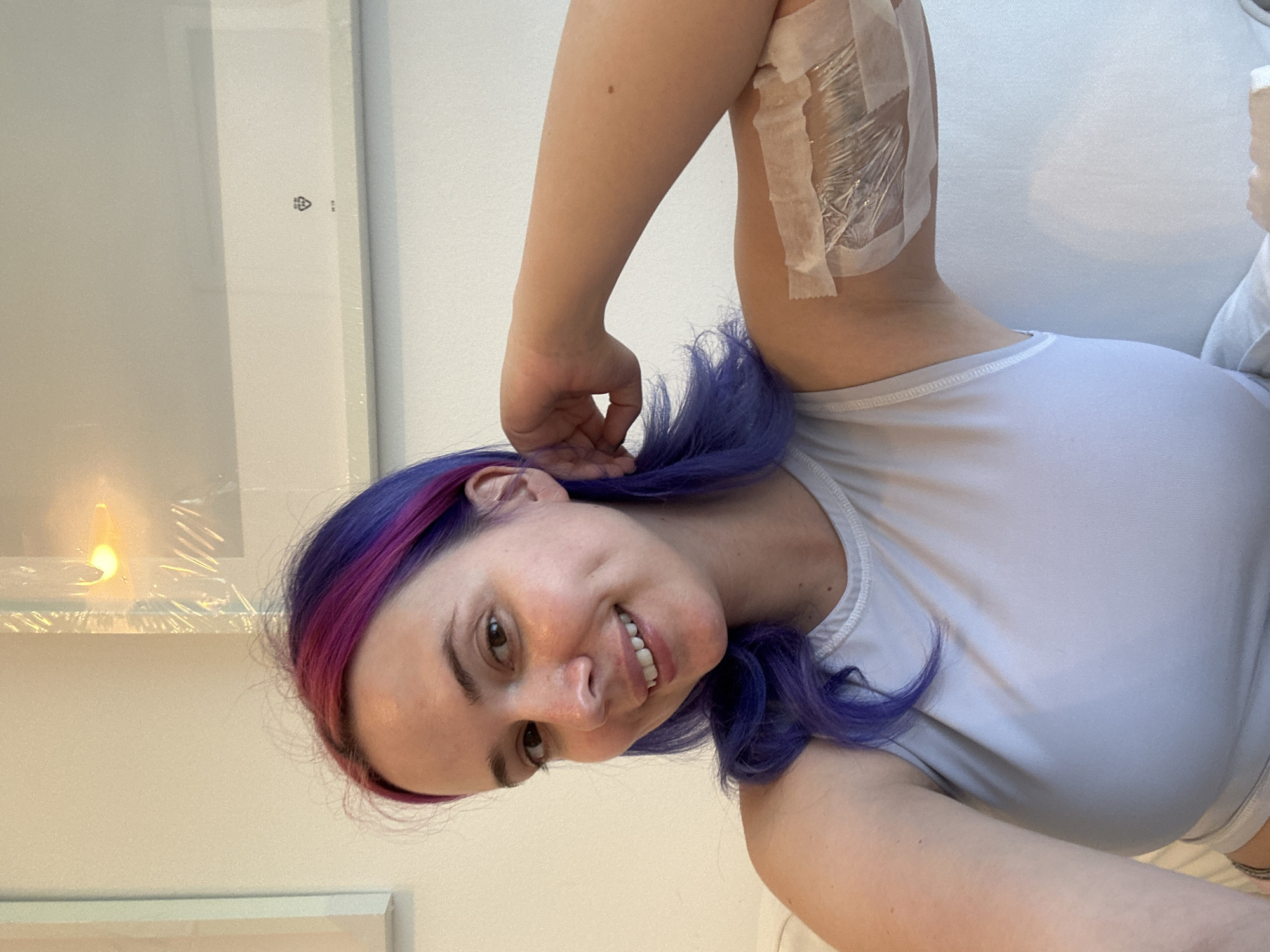 Portrait of smiling woman with colorful hair captured in Zagreb