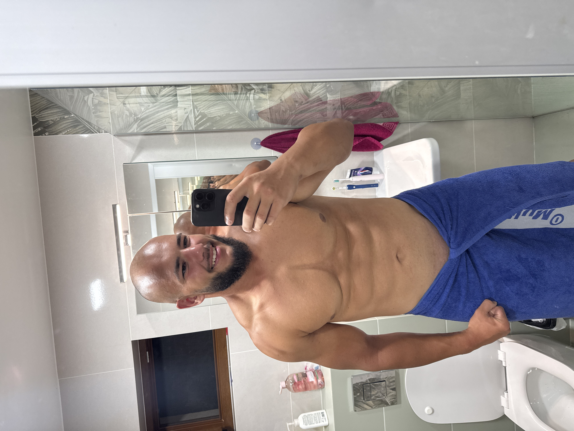 Mirror selfie session in a Sofia bathroom, June 2026.