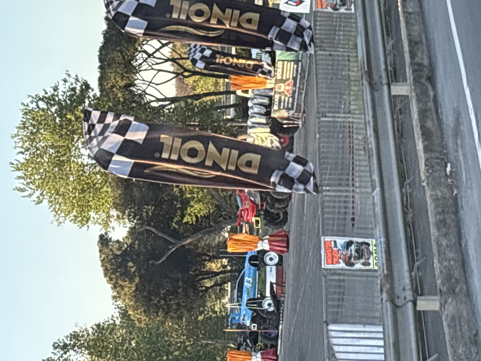 Motorsports event setup with checkered flags observed in Rome