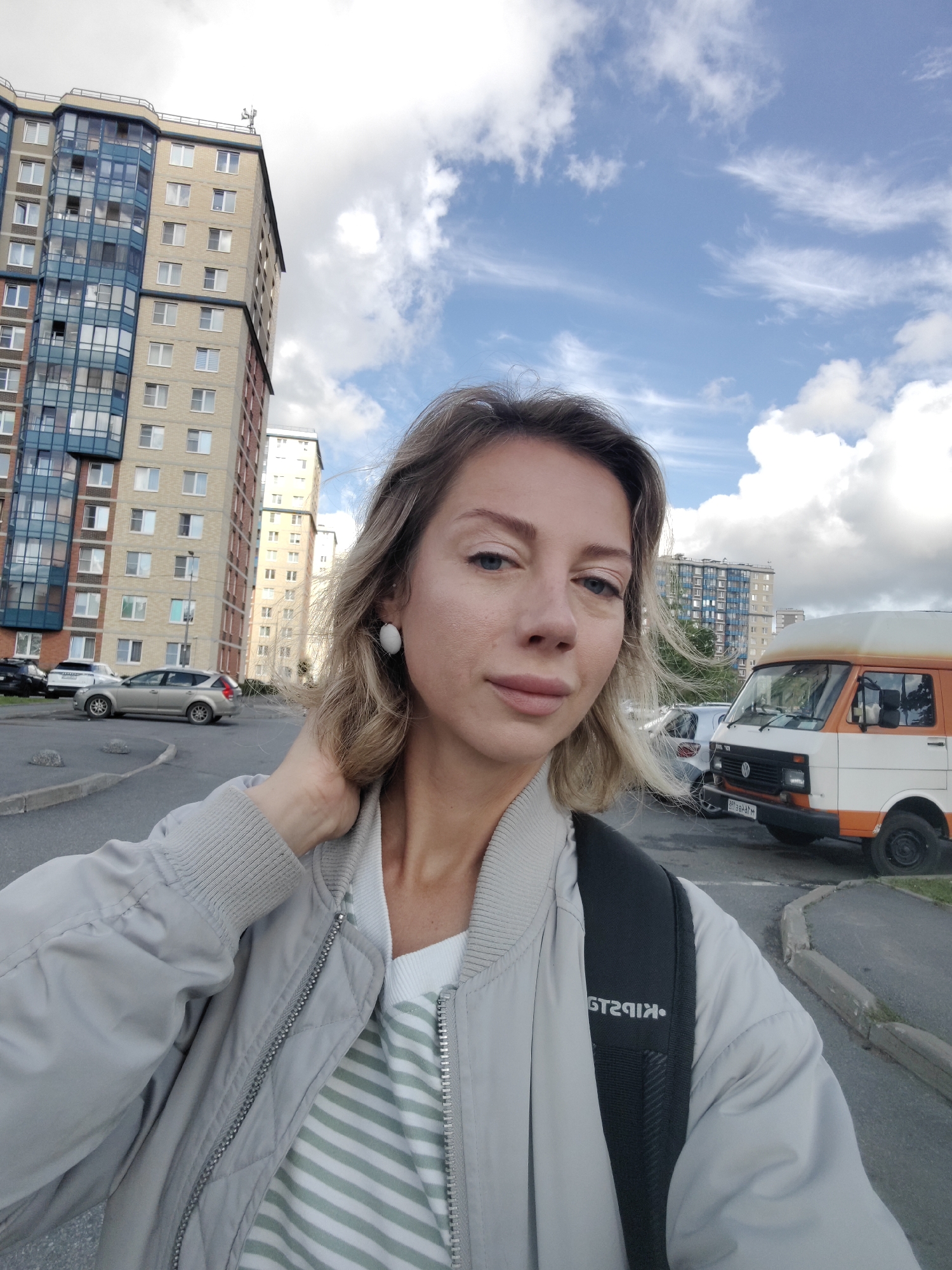 Outdoor selfie in Saint Petersburg, casual layered look