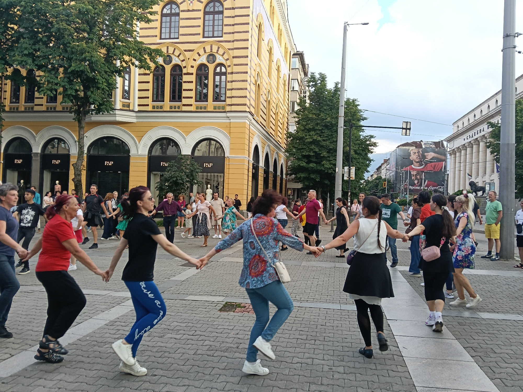 Folk dancers gather for traditional Horo in Sofia square