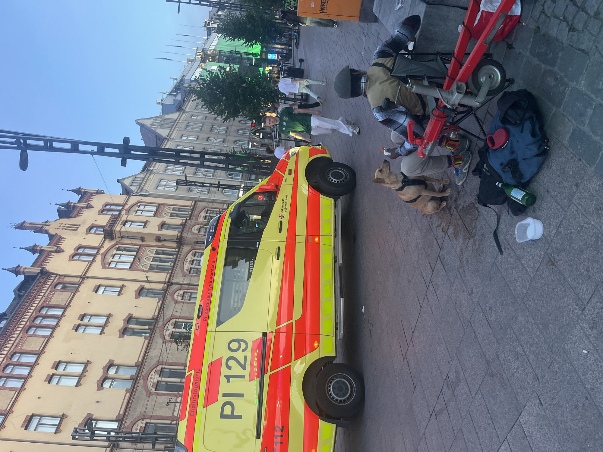 Ambulance responds near Tampere Market Square, July evening