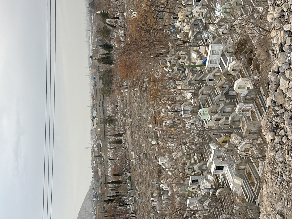 Visitors gather on rocky overlooks above Quetta city