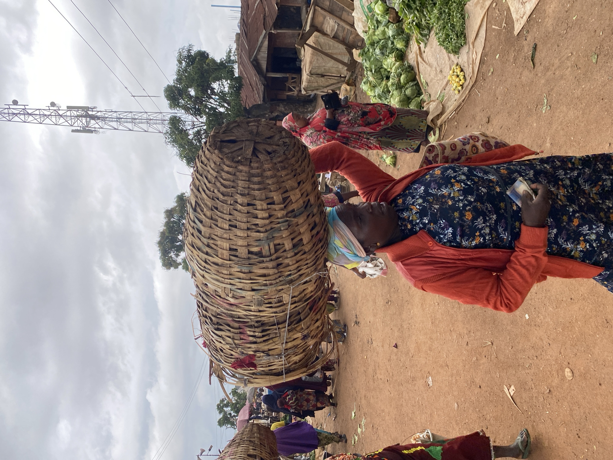 Midday street life and market activity in Bukuru, Nigeria
