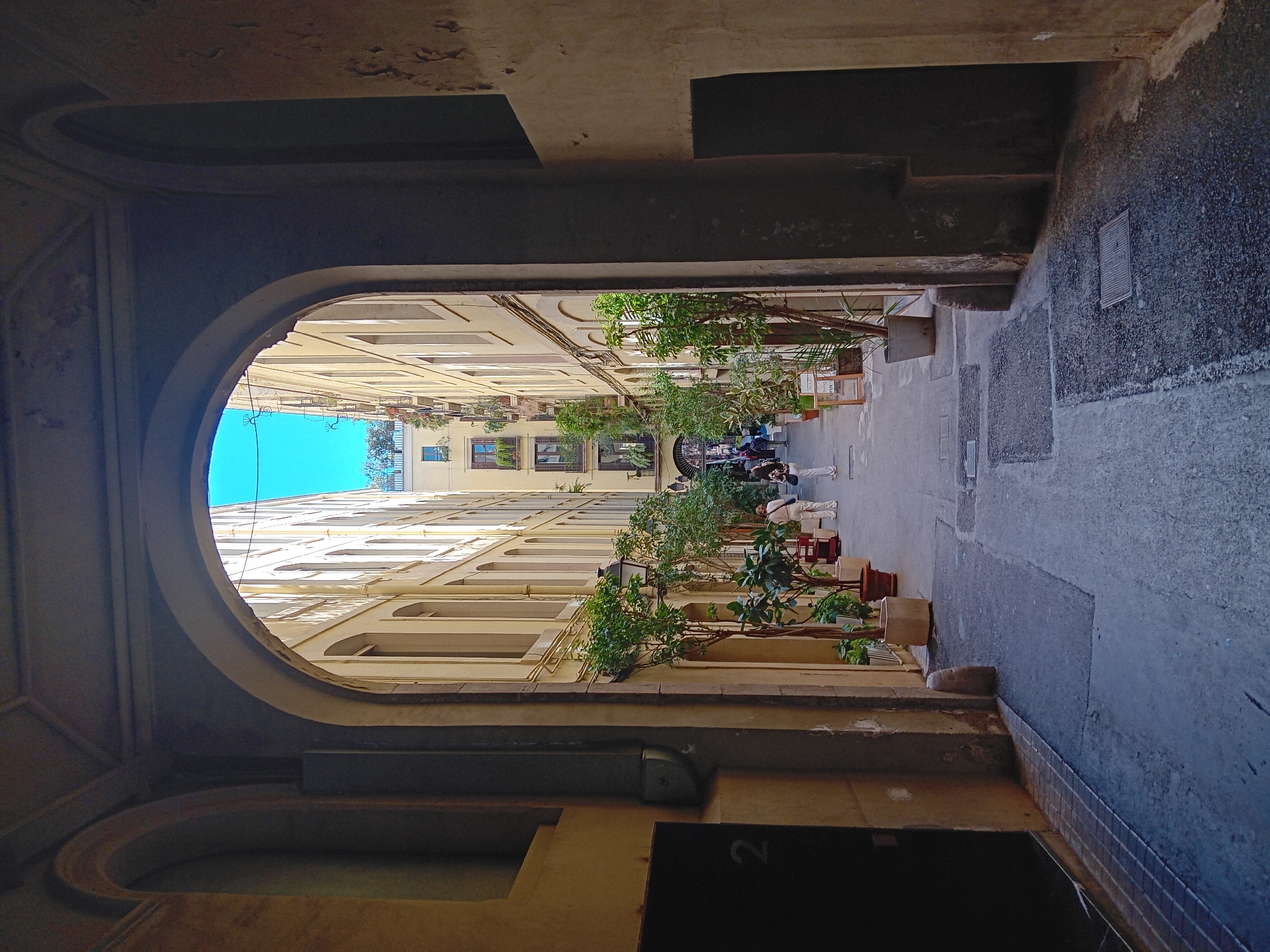 Barcelona archway frames narrow street view