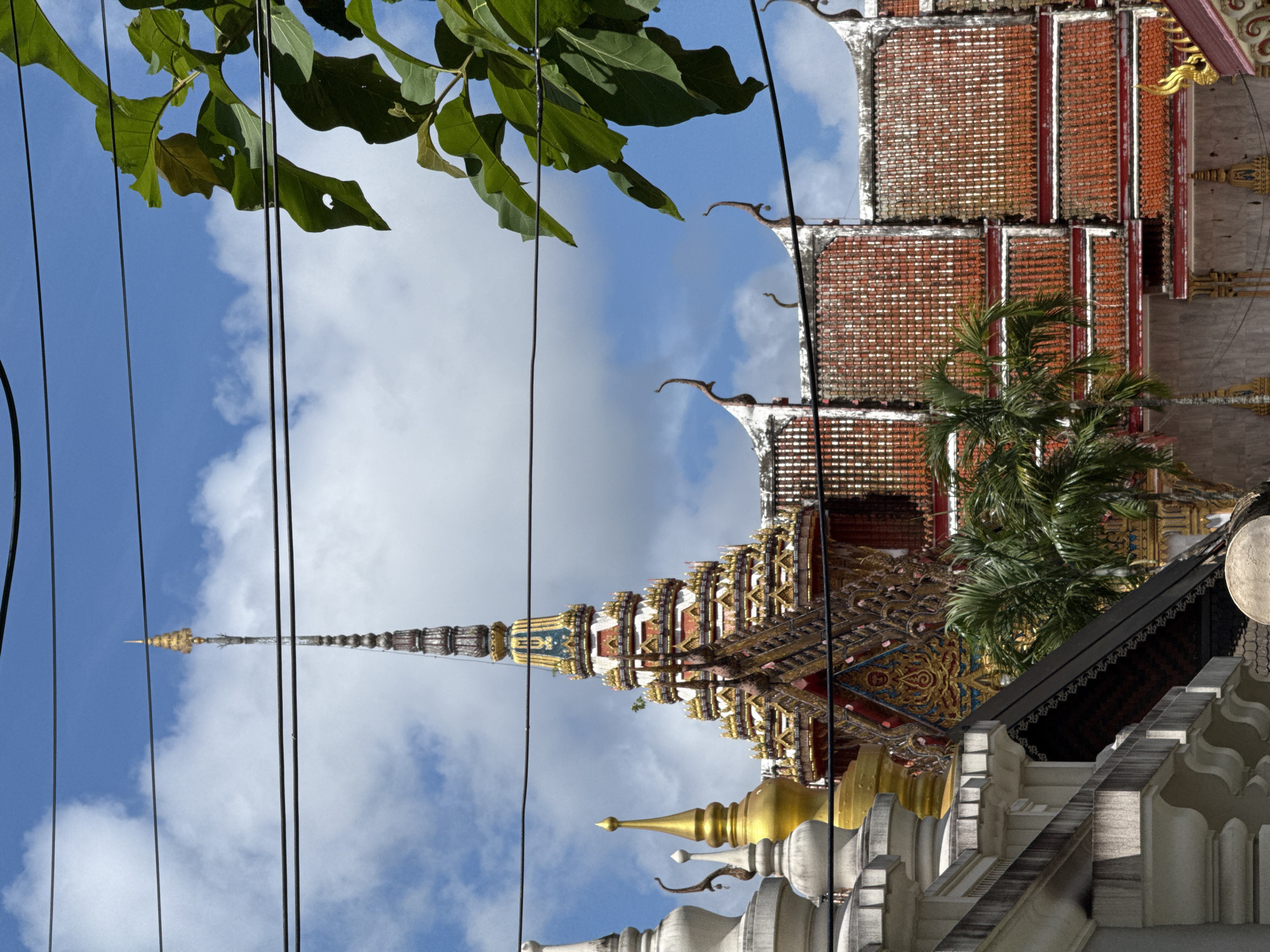 Up-close details of Wat Chalong's spires and rooftops