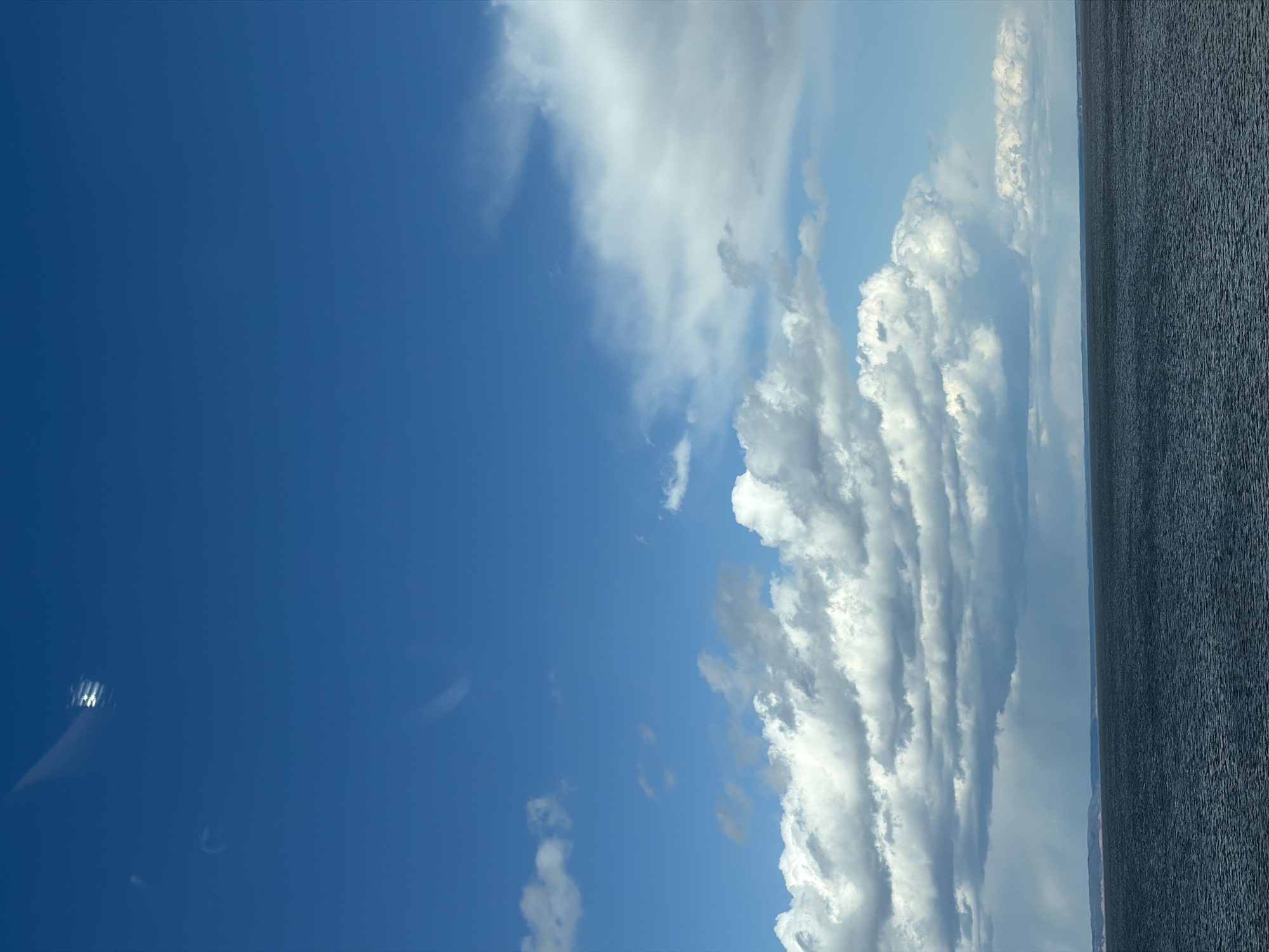 Dramatic sky over water body captured in Chaikovsky, Russia