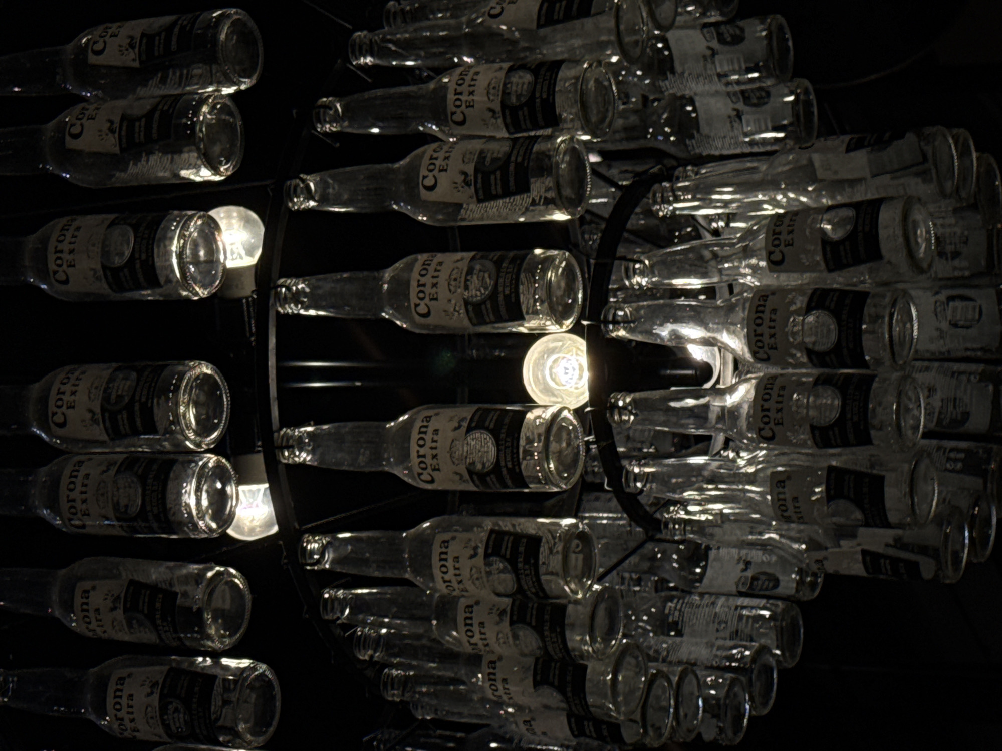 Corona bottle chandelier spotted in Luxembourg venue