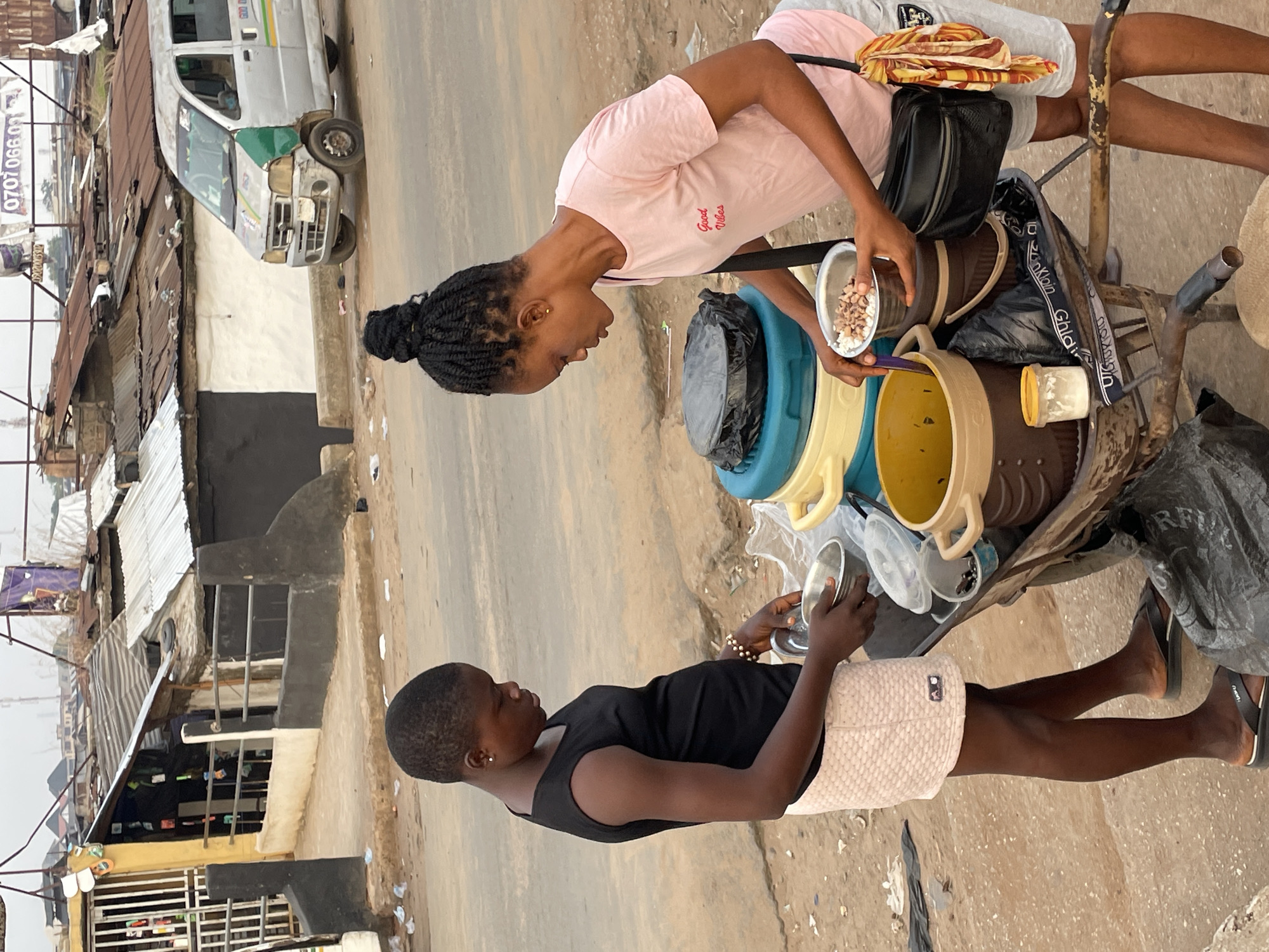 Two women with cart observed on Onitsha street