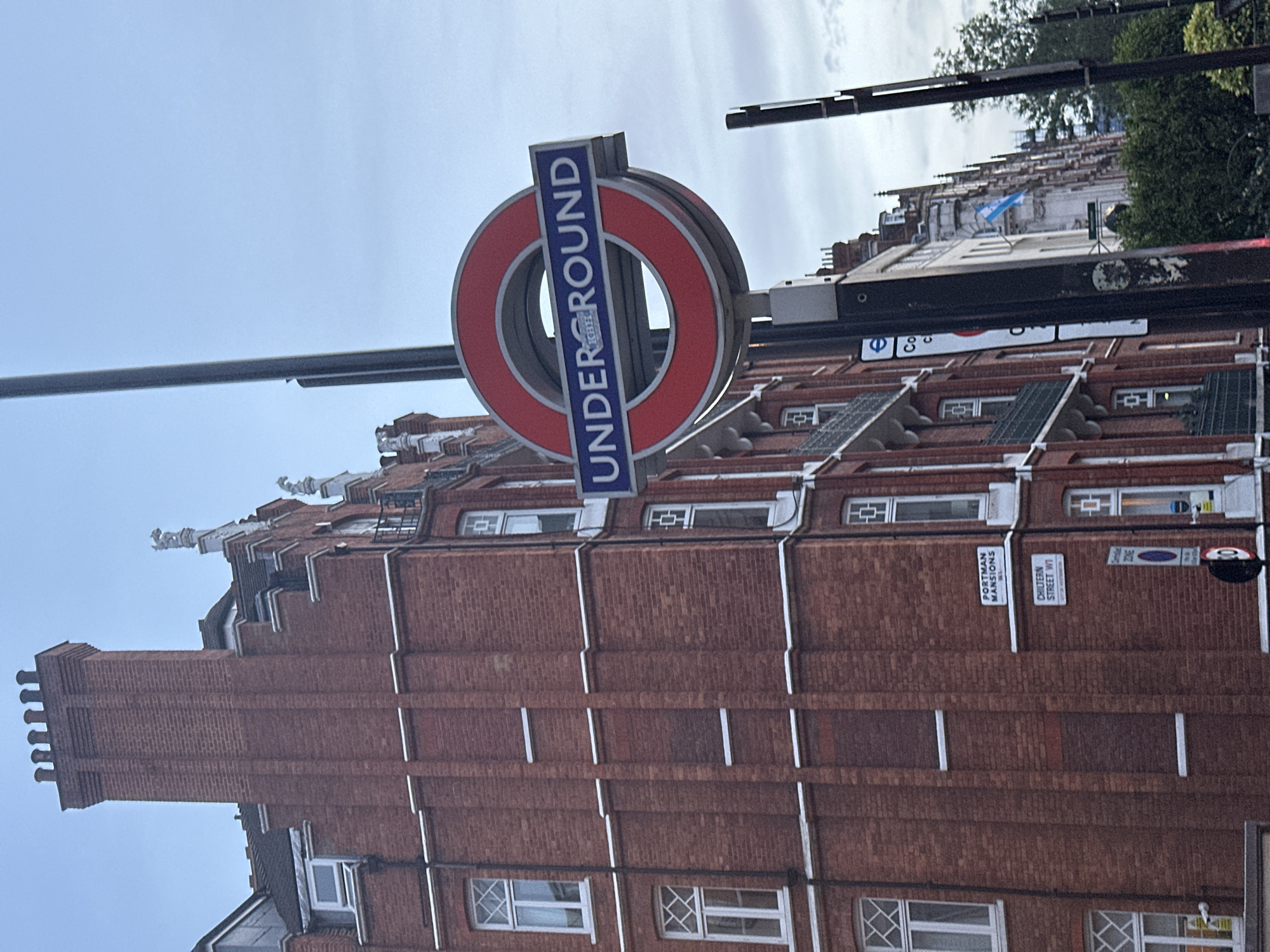 London street scenes show Underground signs, bike shares, traffic