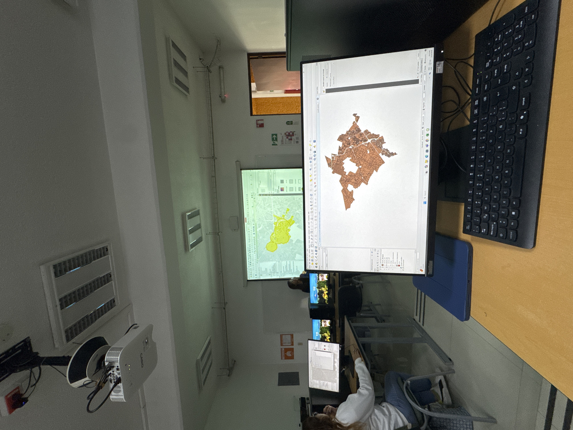 Architecture conference and computer activities documented in San Andrés Cholula