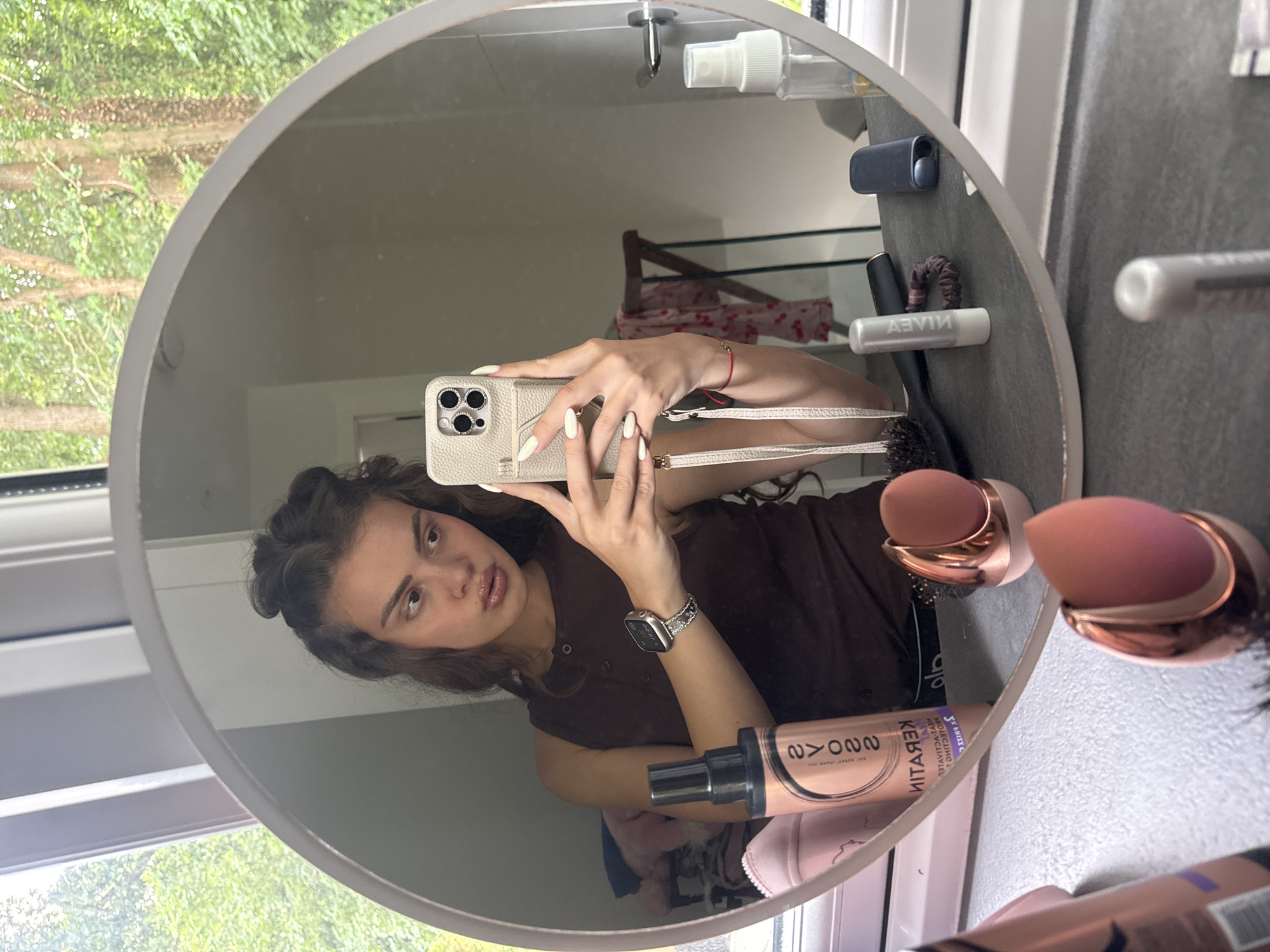 Mirror selfie session at a Throop home, indoors and out